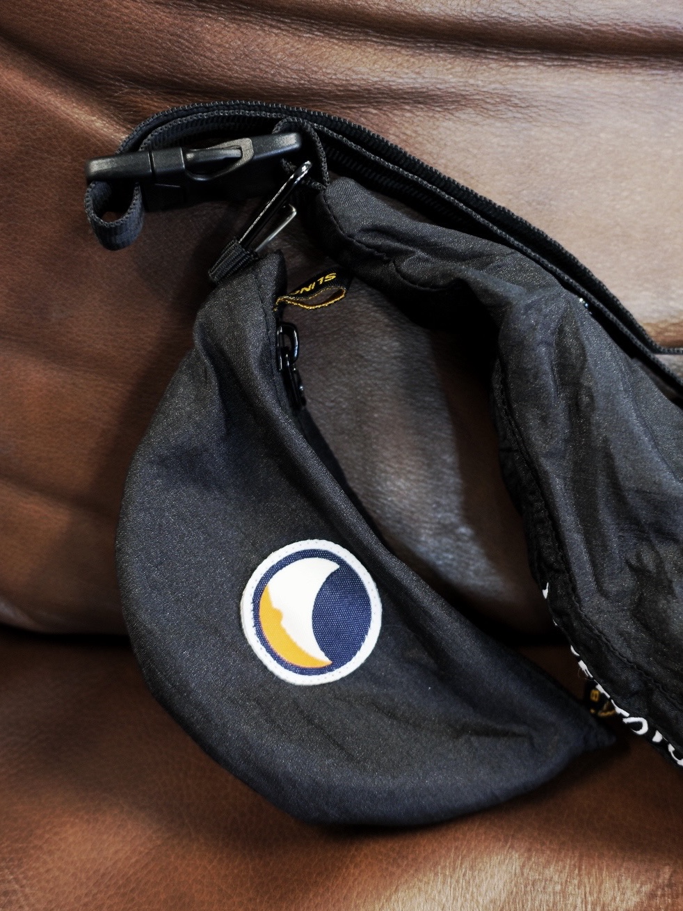 Ticket to the Moon Upcycled Sling Bag Black 착용 스타일