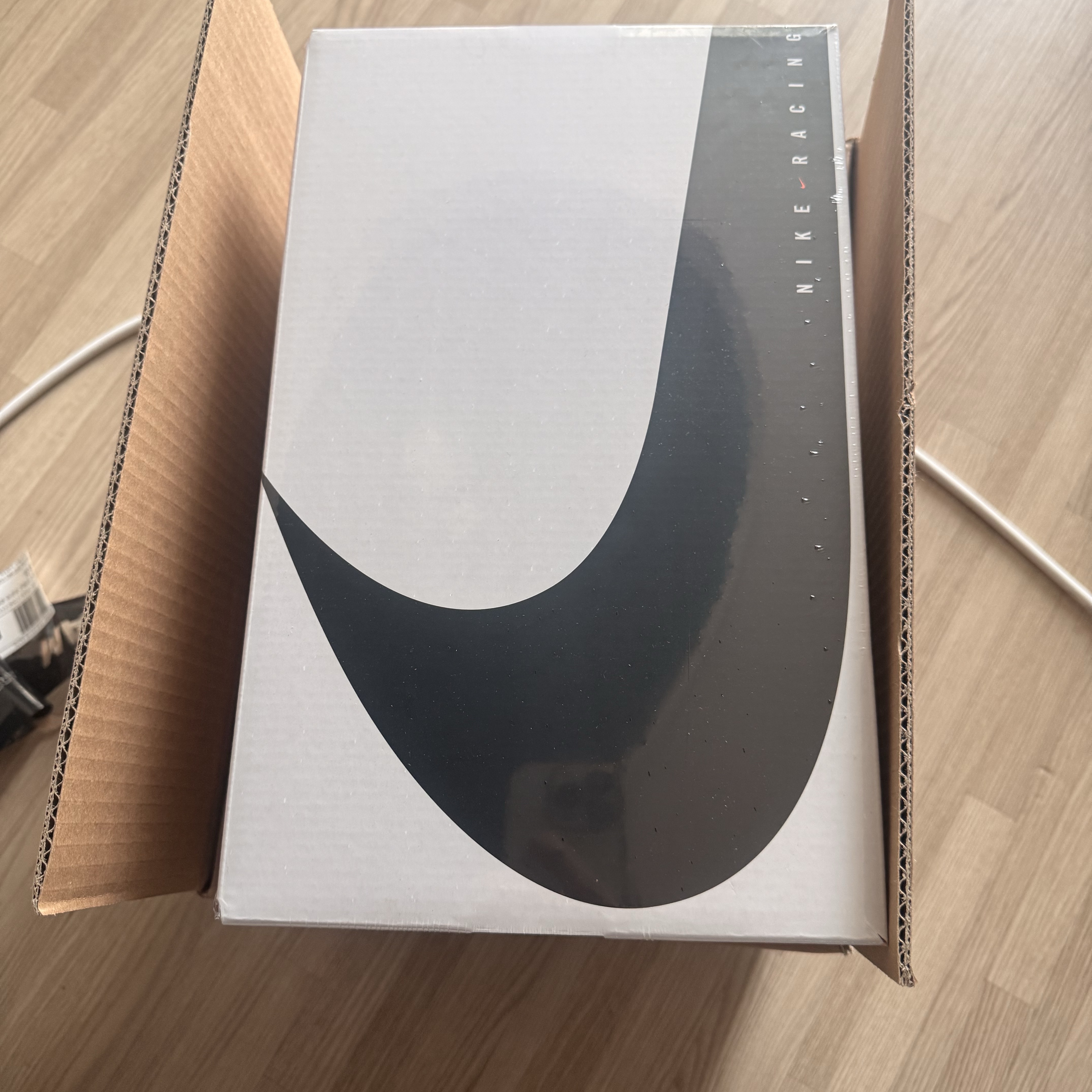 Nike ZoomX Vaporfly Next% 4 White Gridiron 착용 스타일 - 1