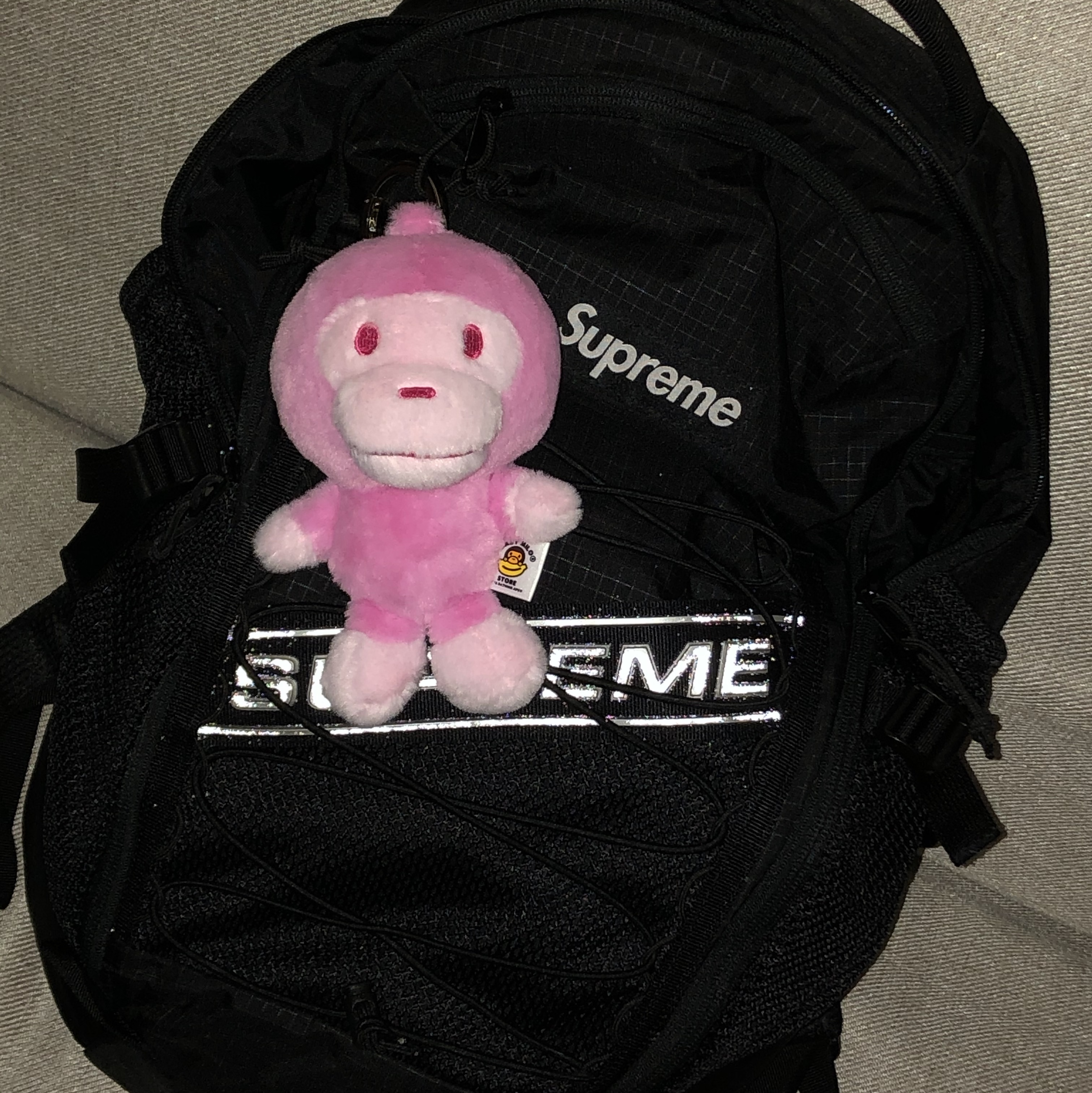 BAPE Baby Milo Plush Doll Keychain Light Pink, Supreme Backpack Black - 23FW 착용 스타일