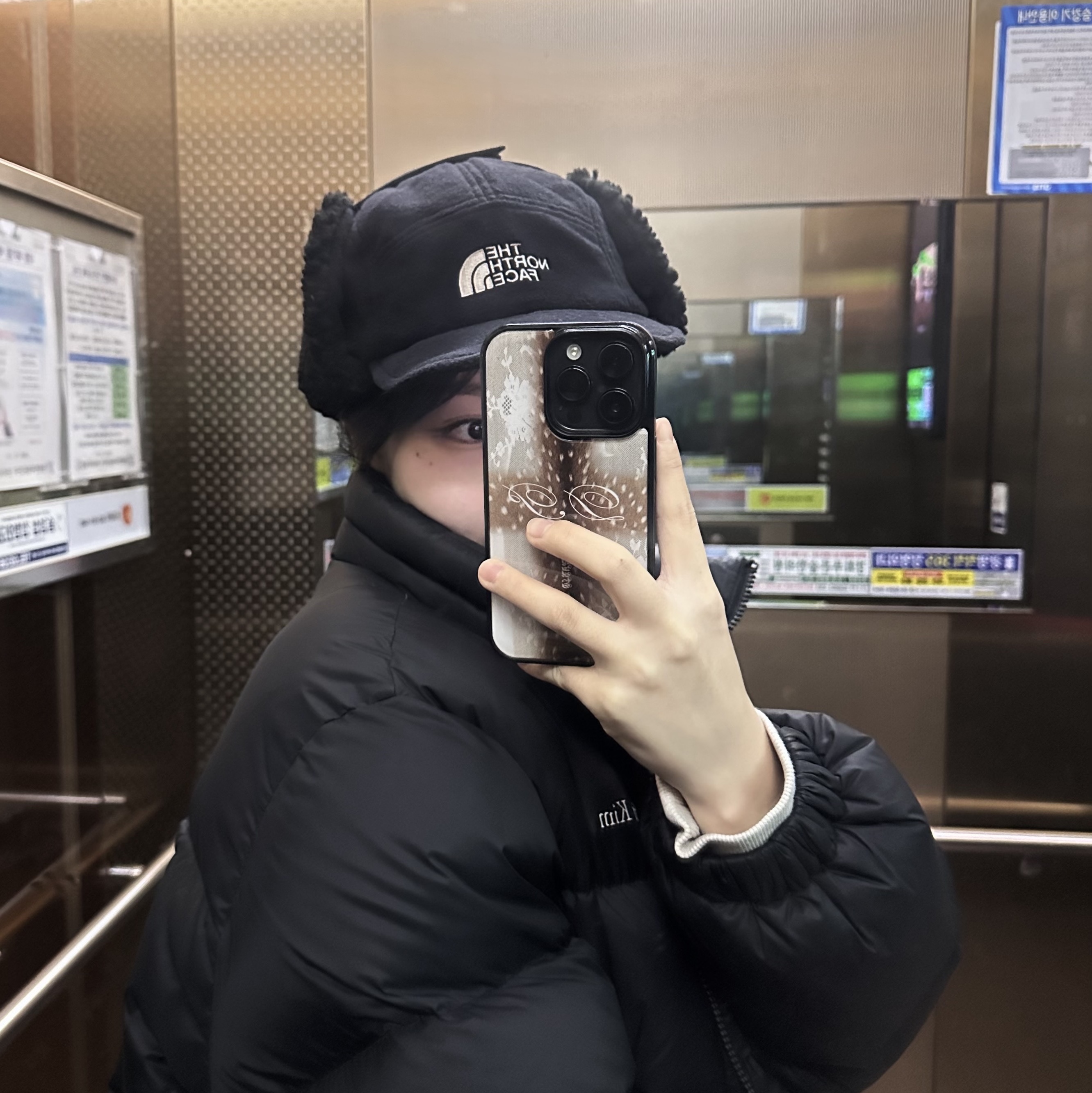 The North Face Fleece Earmuff Cap EX Black 착용 스타일