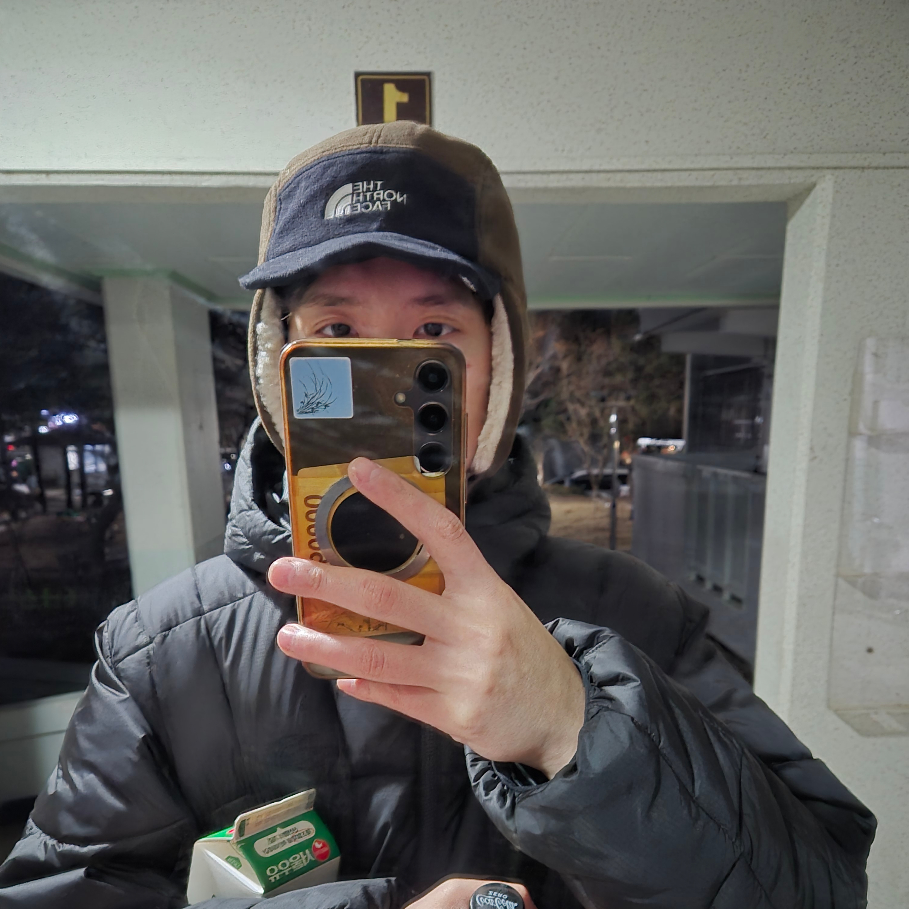 The North Face Fleece Earmuff EX Cap Cocoa Brown 착용 스타일