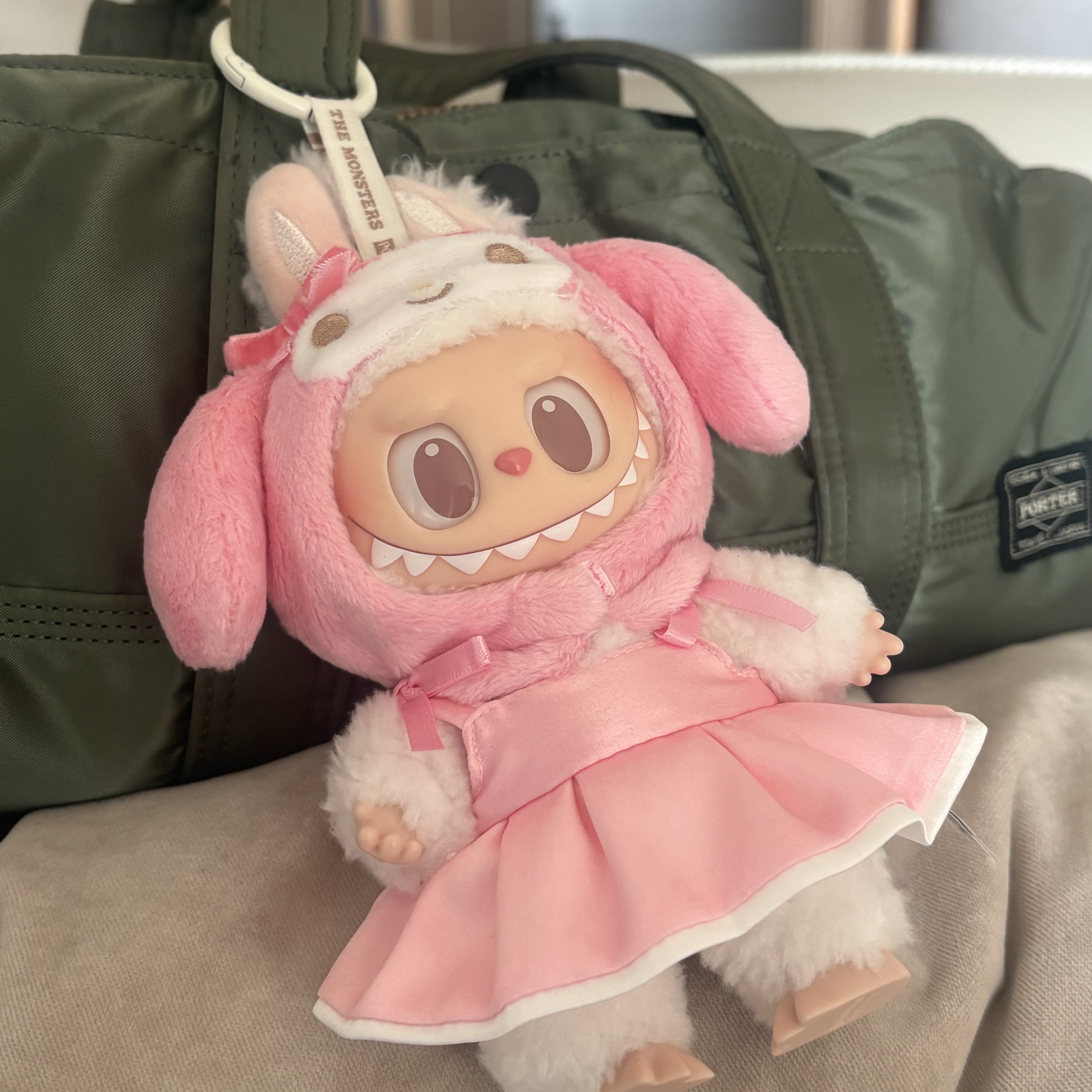 Pop Mart Labubu The Monsters x Hello Kitty And Friends Series Plush Pendant My Melody (Opened Case), Porter Tanker Duffle Bag L Sage Green 착용 스타일