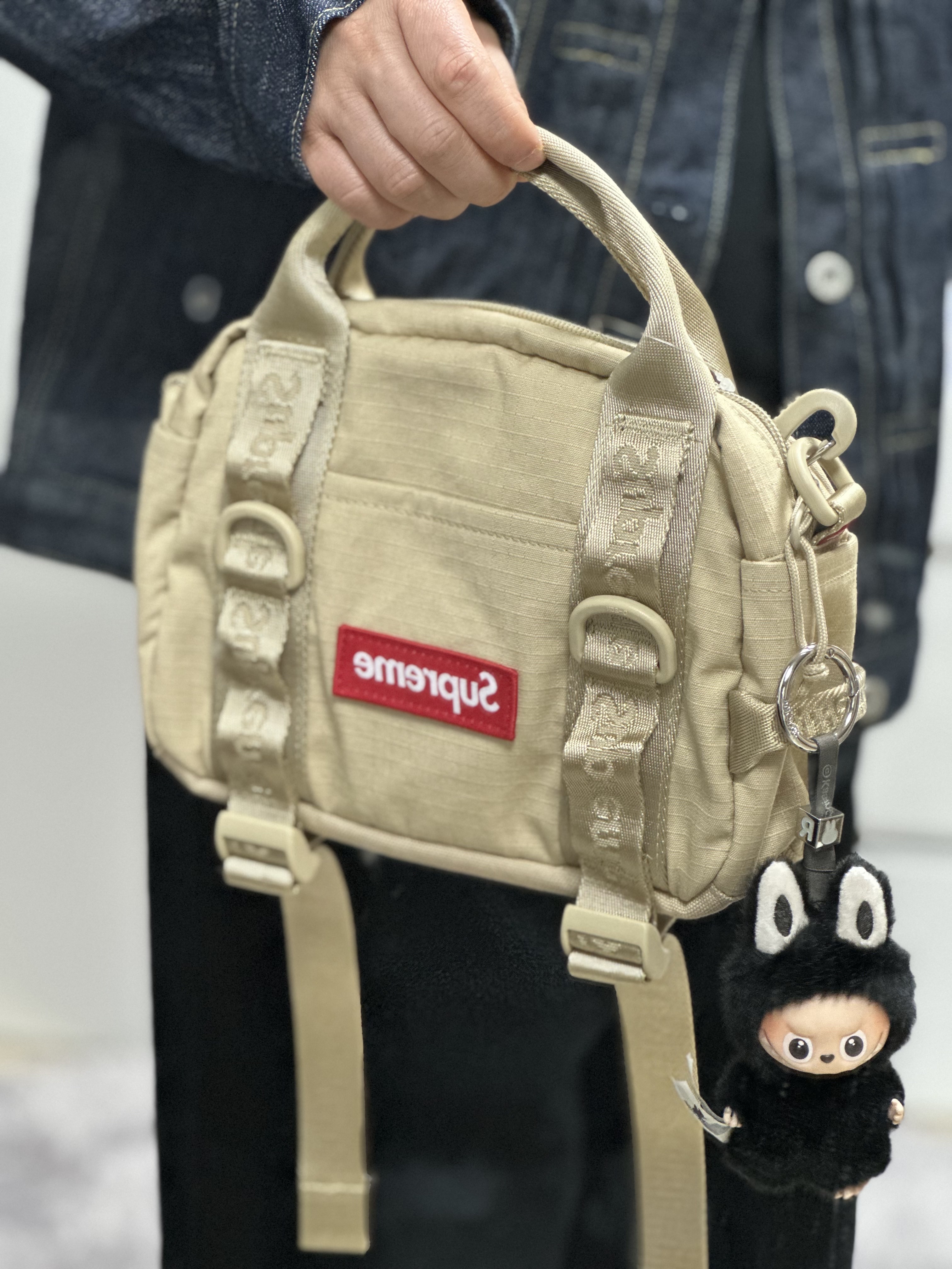 Supreme Mini Duffle Bag Tan - 26SS, Pop Mart Labubu The Monsters Pin For Love Series Vinyl Plush Pendant (N-Z) R (Opened Case) 착용 스타일
