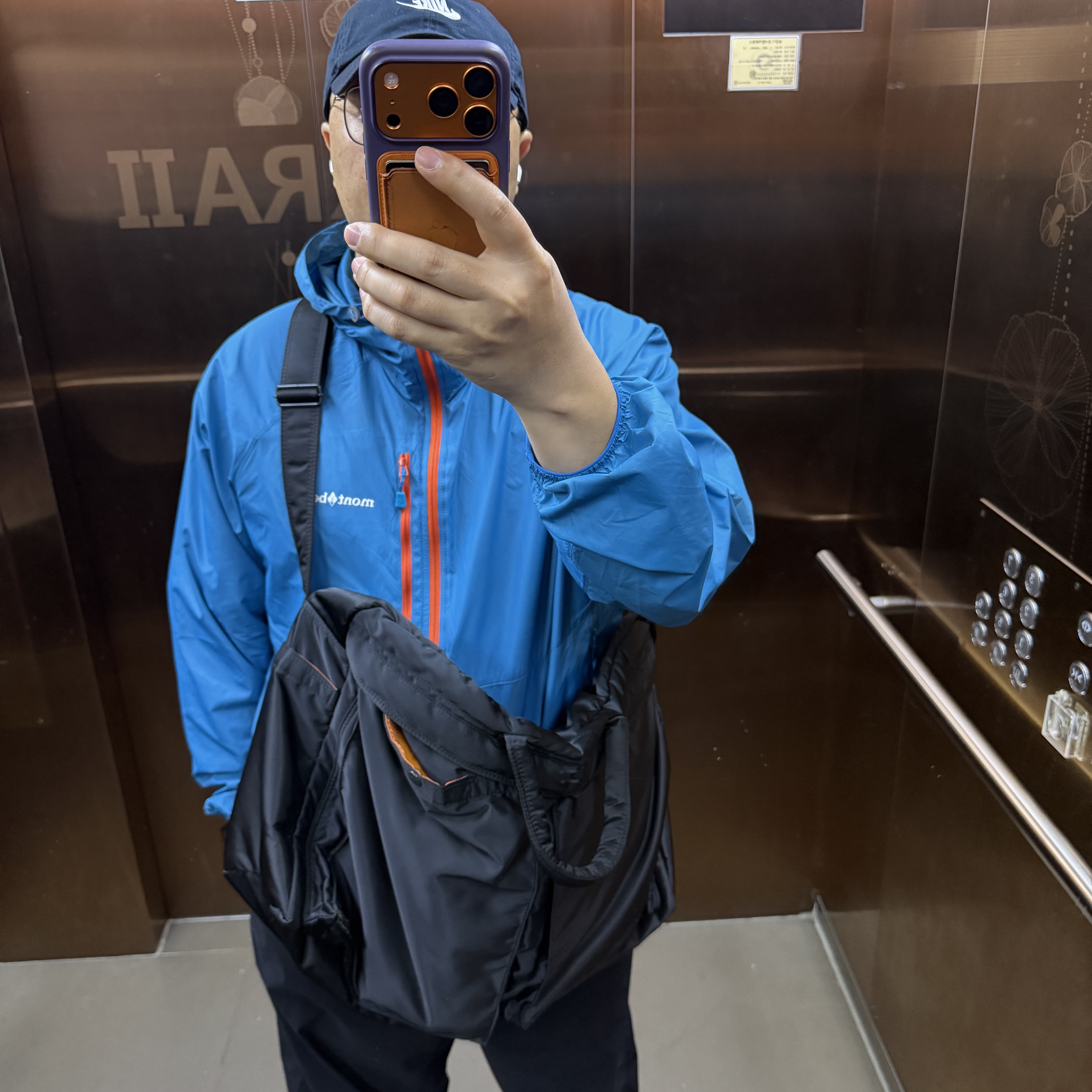 Montbell Wind Blast Hooded Jacket Turquoise 착용 스타일