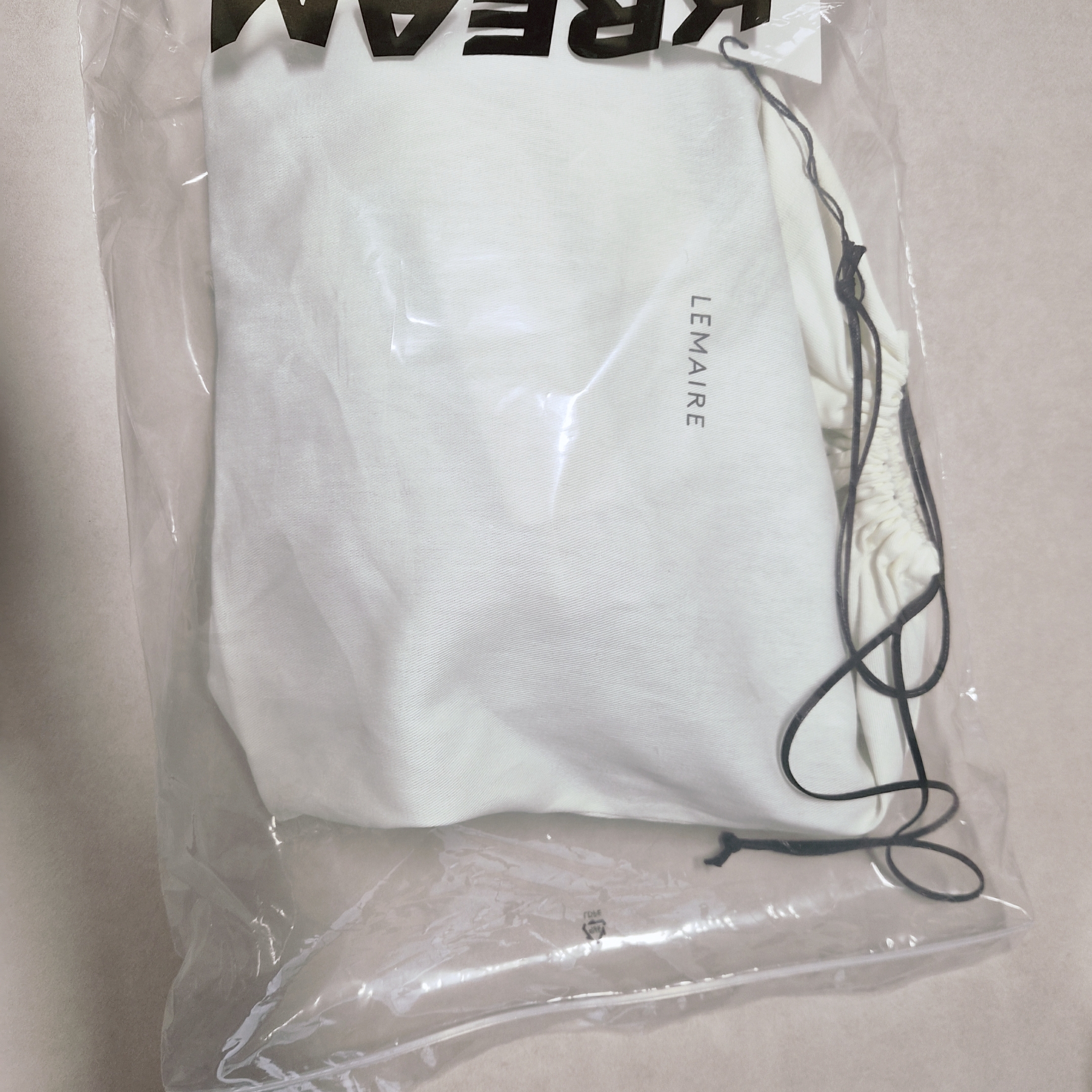 Lemaire Small Croissant Bag Soft Grained Leather Dark Chocolate, (W) Nike Cortez Light Armory Blue 착용 스타일 - 1