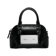 Matin Kim Curve Zip Mini Bag In Black