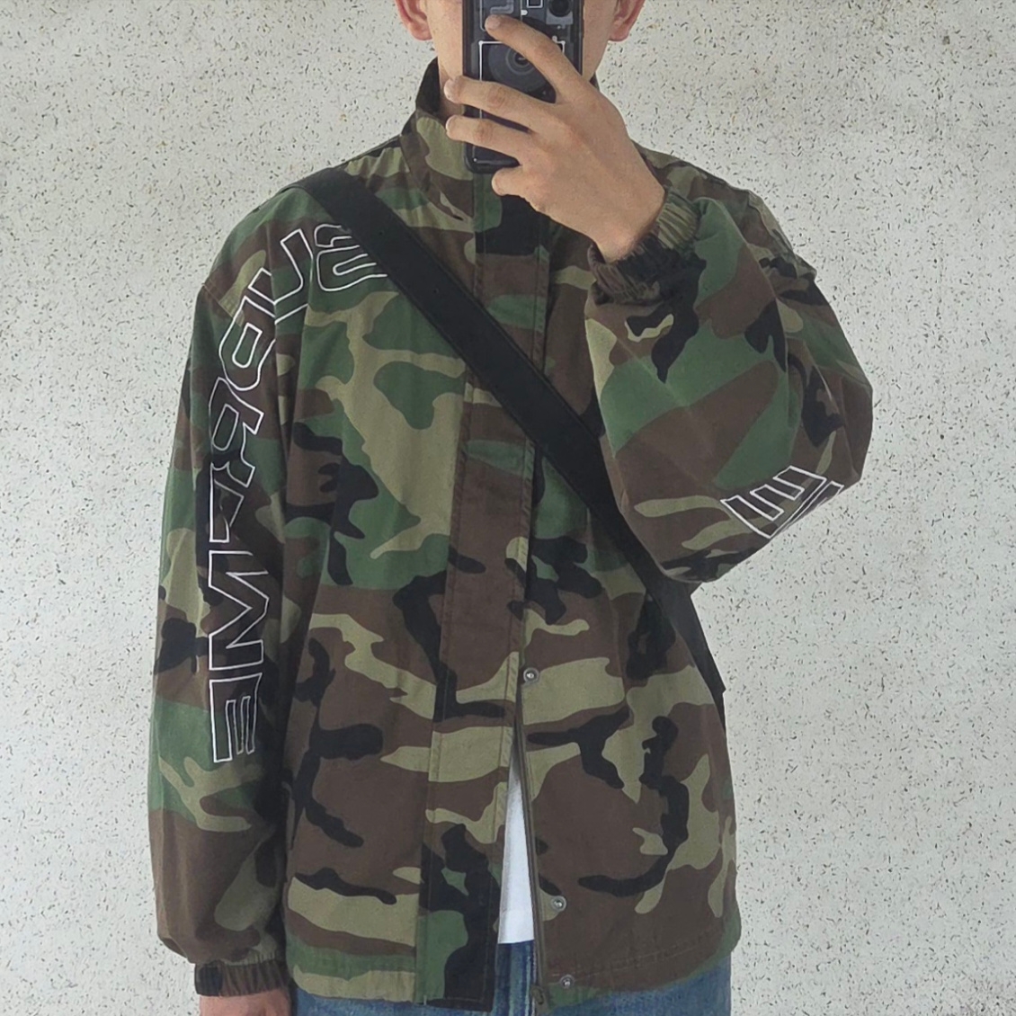 Supreme Spellout Embroidered Ripstop Track Jacket Woodland Camo - 25FW 착용 스타일
