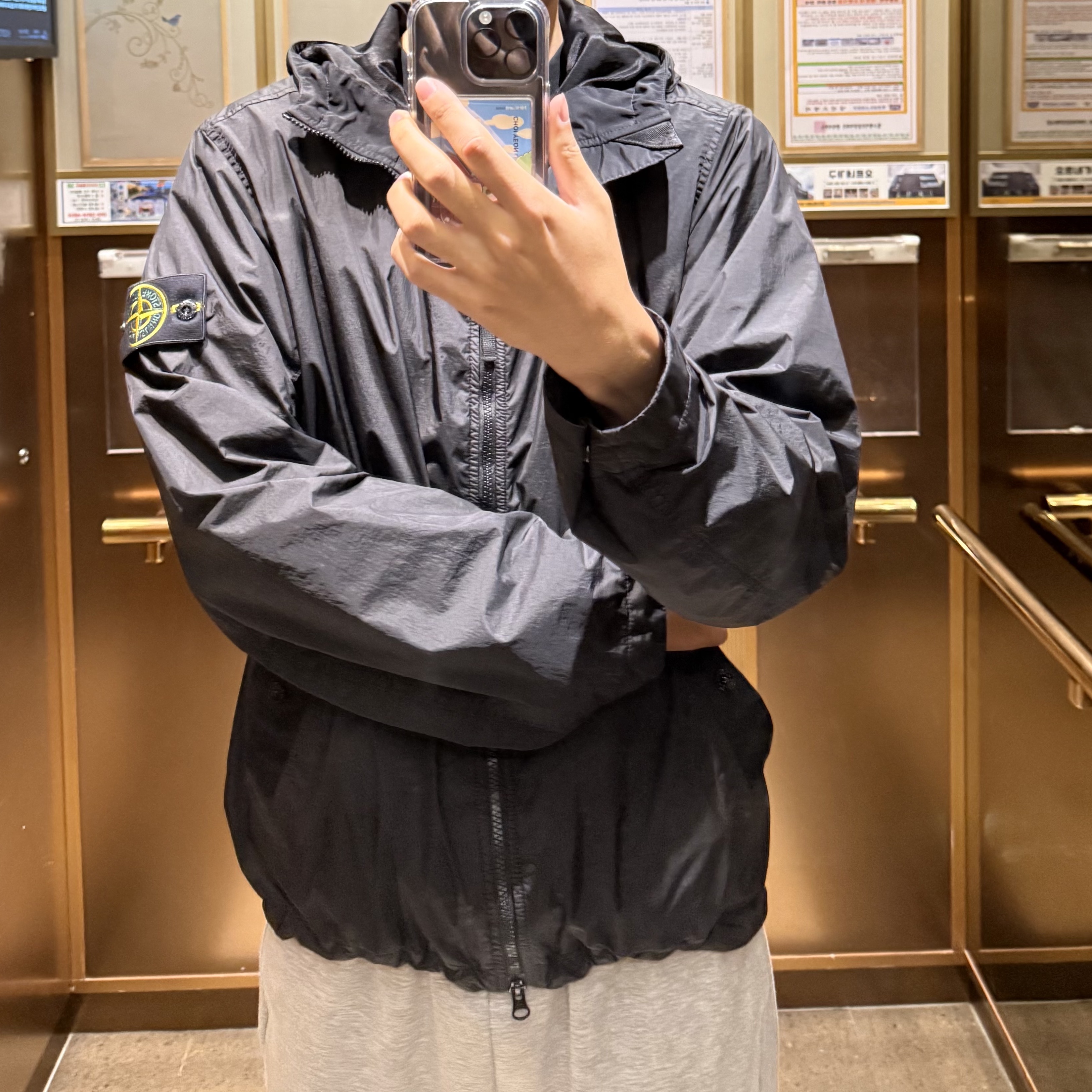 Stone Island 4100001 Crinkle Reps NY Hooded Jacket with Wind Resistance and Anti-Drop Black - 26SS 착용 스타일