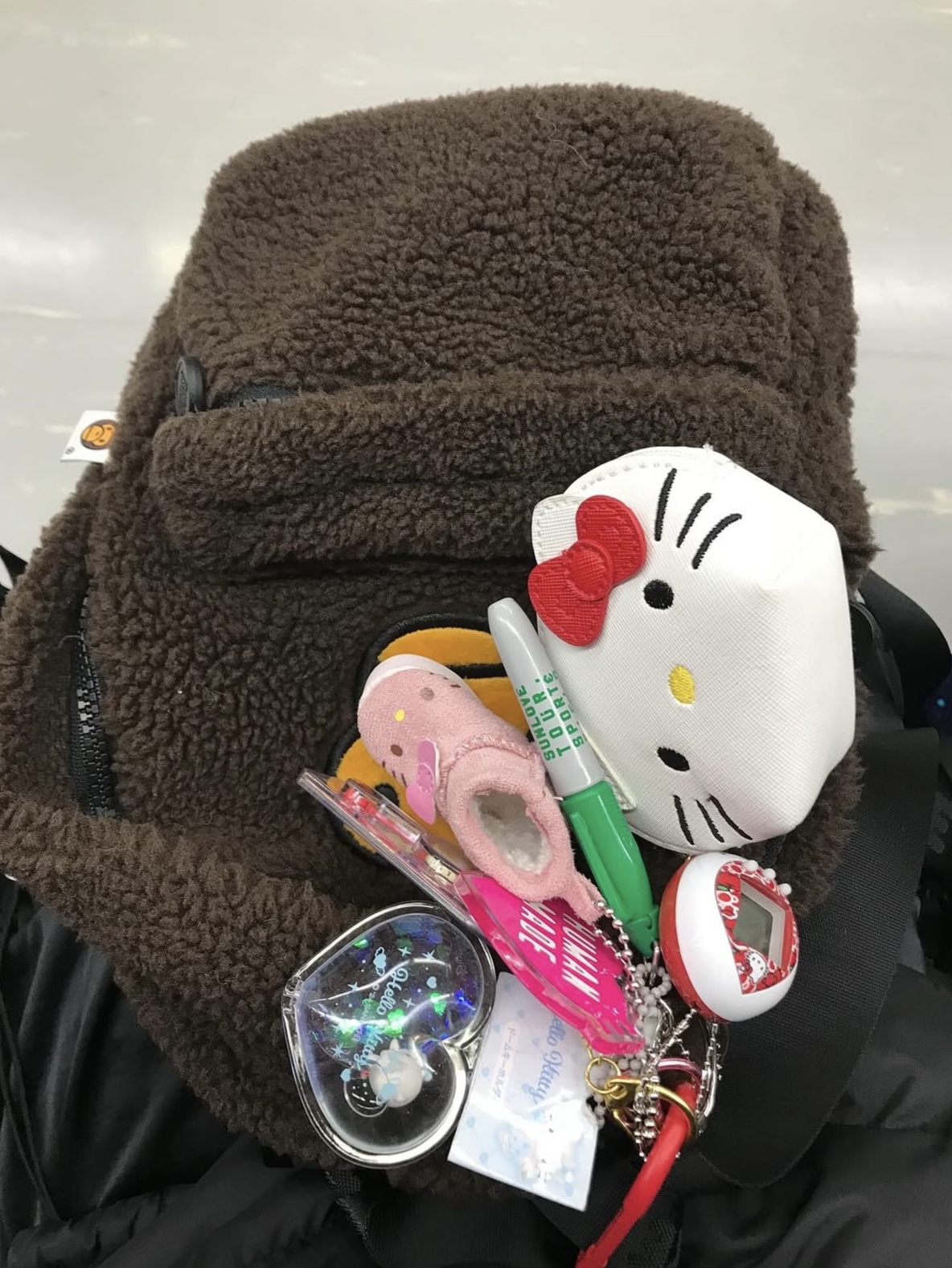 BAPE Baby Milo Mini Fur Backpack Brown 착용 스타일
