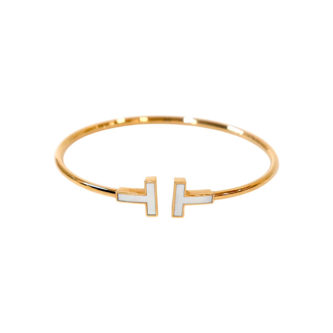 IT73ACWTTJKE Tiffany & Co. 750 18K Gold T Wire Bracelet C-B61942
