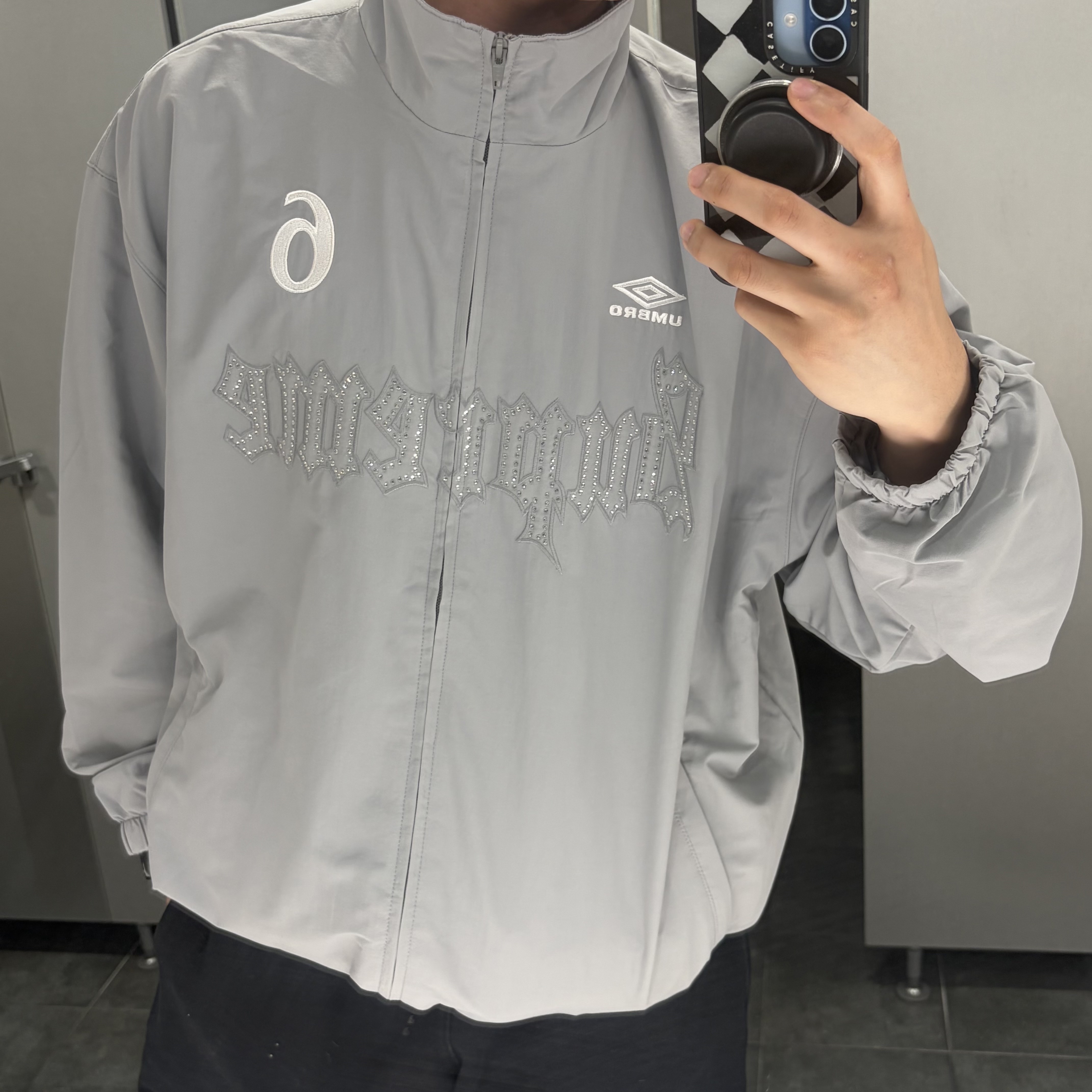 Supreme x Umbro Rhinestone Track Jacket Light Grey - 26SS 착용 스타일