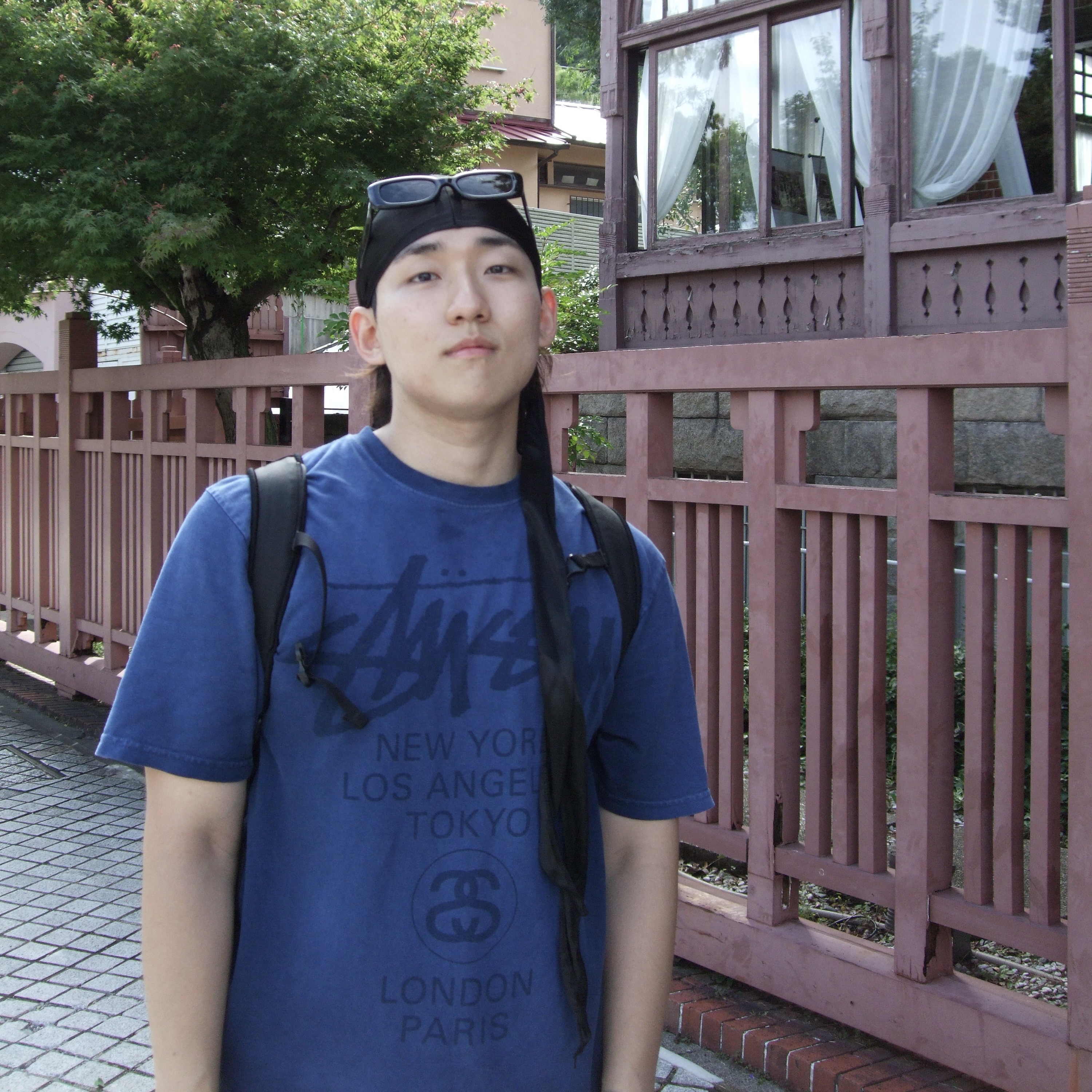 Stussy World Tour T-Shirt Sun Faded Navy 착용 스타일