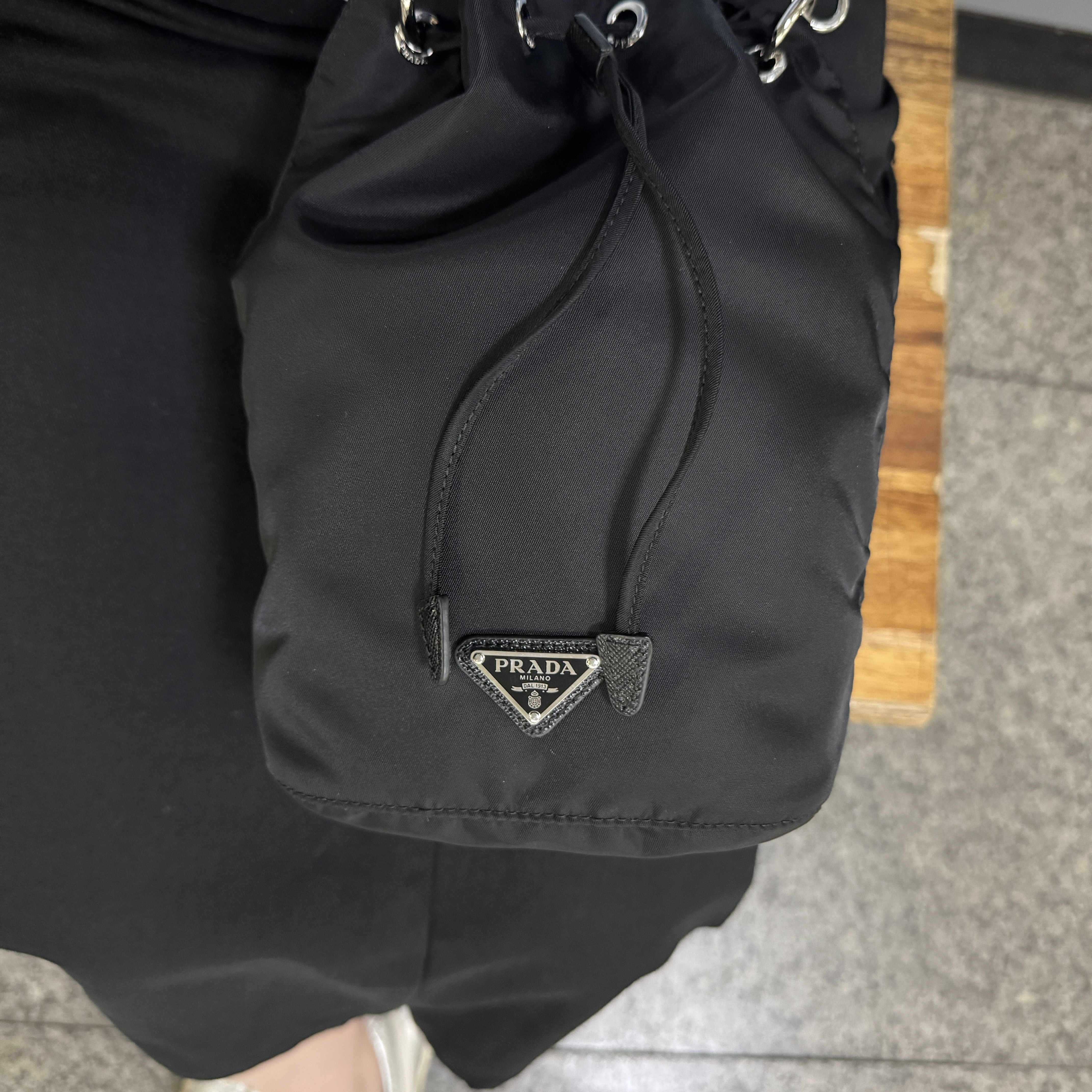 Prada Tessuto Nylon Pouch Black 착용 스타일