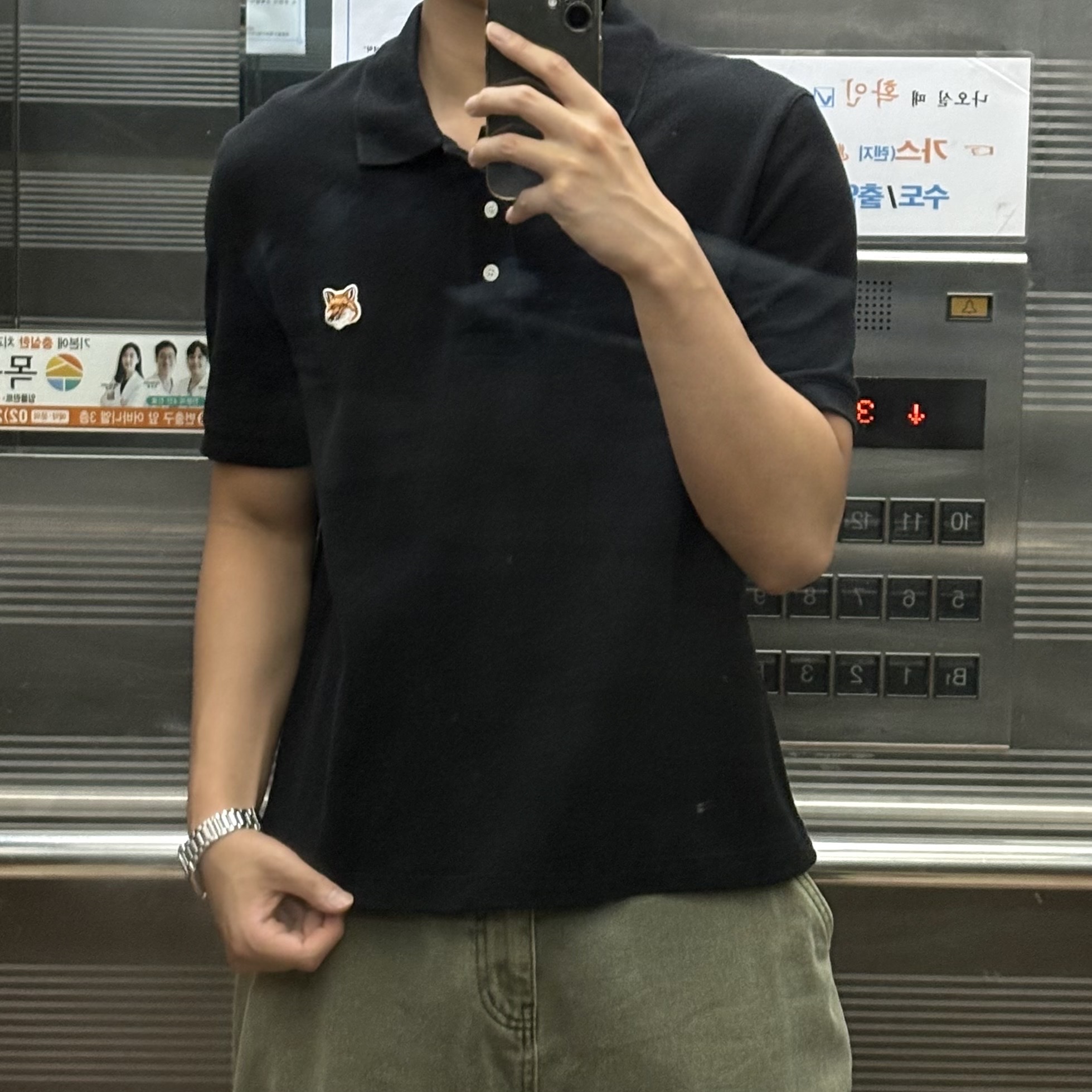 Maison Kitsune Fox Head Patch Polo Black 착용 스타일