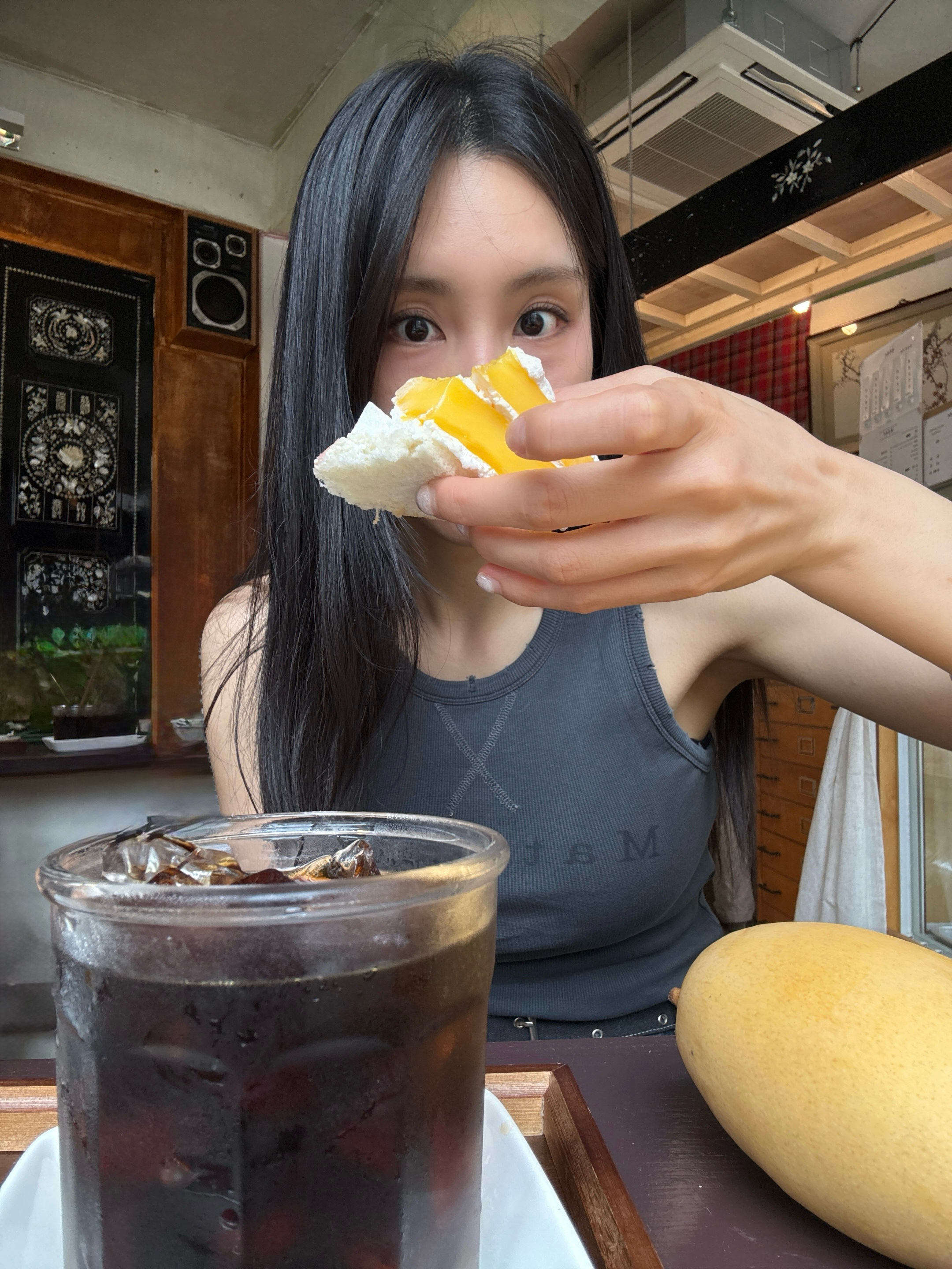 (W) Matin Kim Cargo Mini Denim Skort In Blue, (W) Matin Kim Distressed Sleeveless Logo Top In Charcoal 착용 스타일 - 5