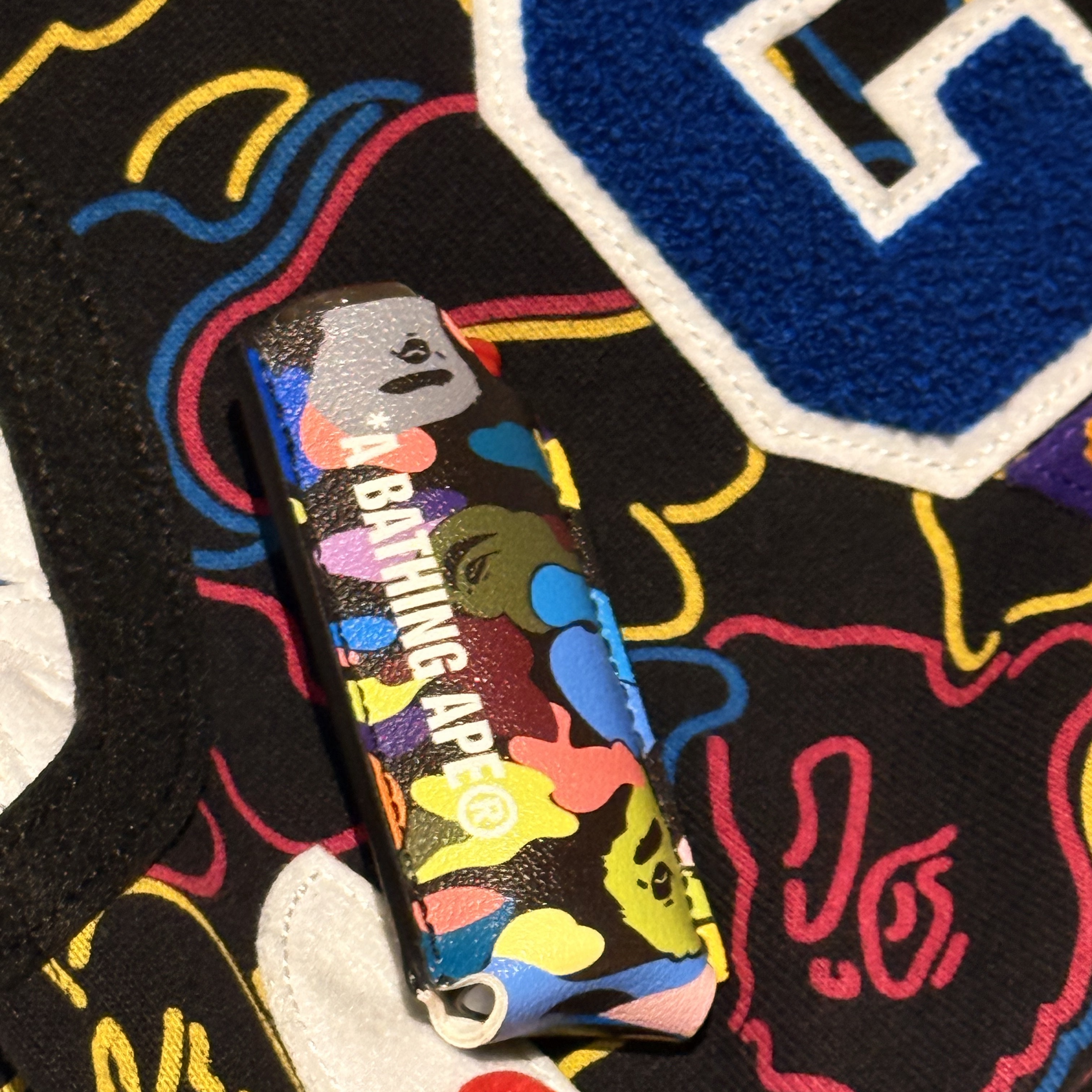 BAPE Multi Camo Lighter Case Black 착용 스타일