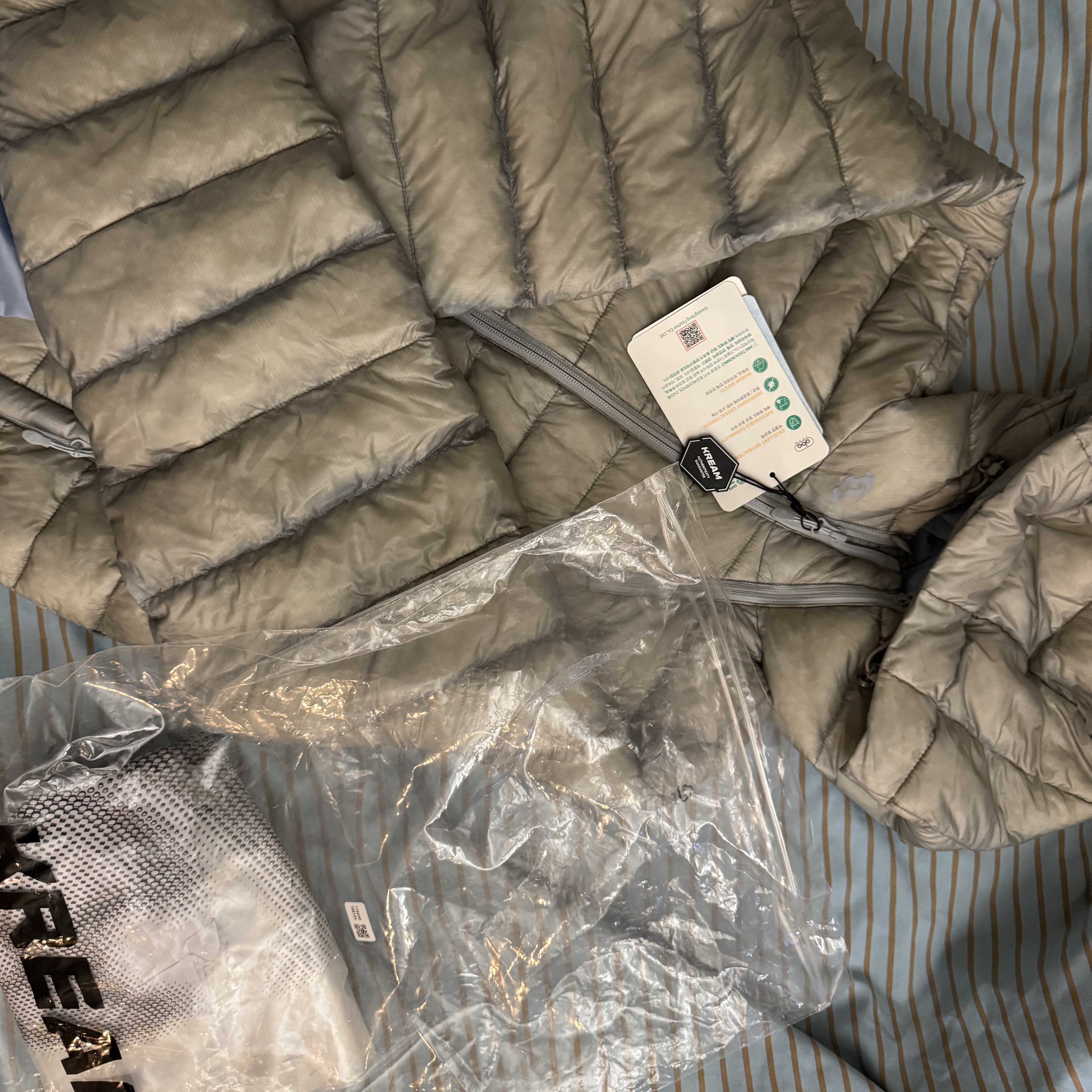 Sansan Gear Suffix Puffer Jacket Grey - 25FW 착용 스타일