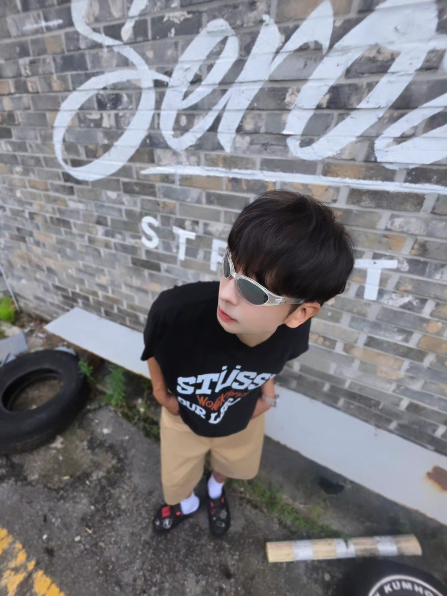 Stussy x Our Legacy Work Shop Pigment Dyed Collegiate T-Shirt Black, Crocs x Staple Classic All Terrain Clog Black 착용 스타일 - 1