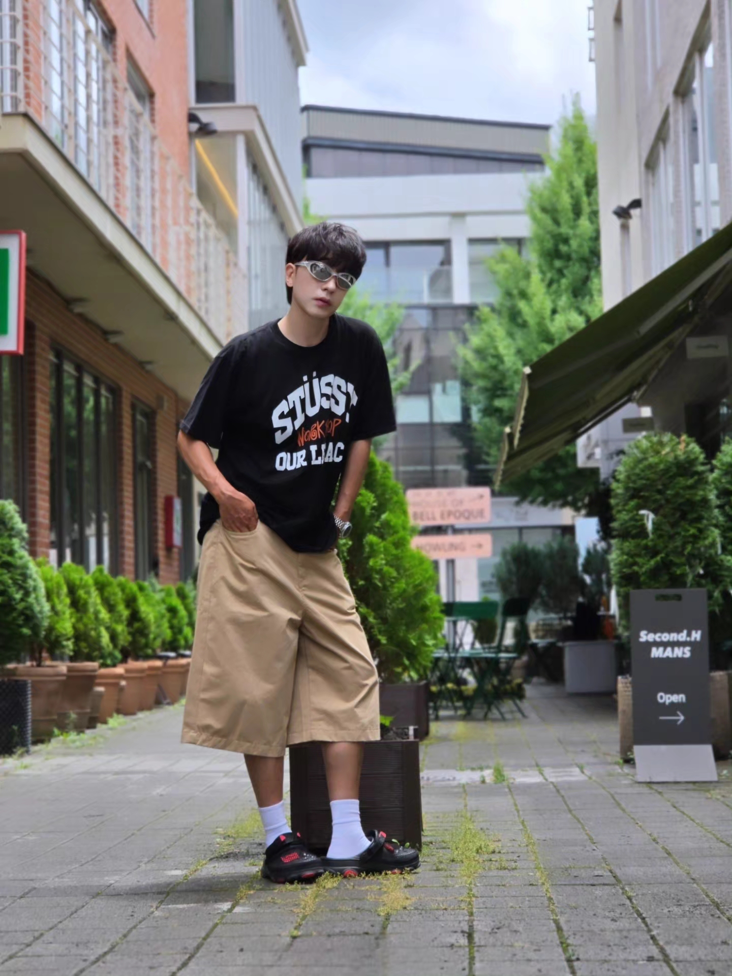 Stussy x Our Legacy Work Shop Pigment Dyed Collegiate T-Shirt Black, Crocs x Staple Classic All Terrain Clog Black 착용 스타일 - 2