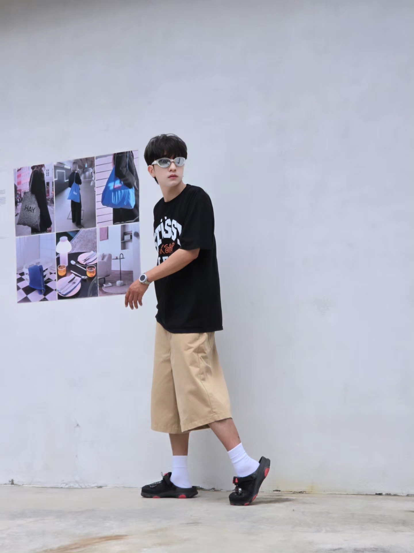 Stussy x Our Legacy Work Shop Pigment Dyed Collegiate T-Shirt Black, Crocs x Staple Classic All Terrain Clog Black 착용 스타일 - 1