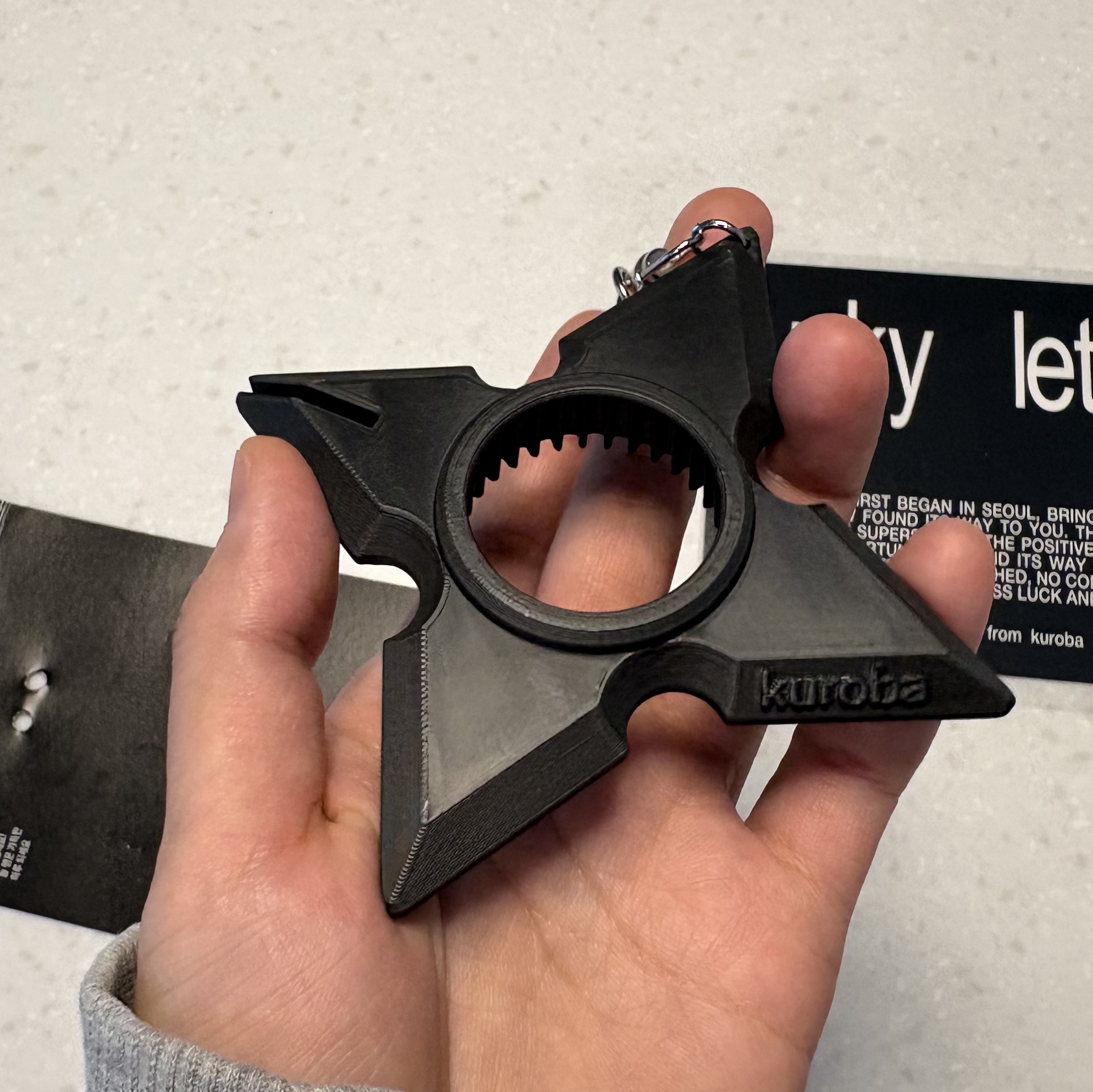 [KREAM 단독] KUROBA NINJA BOTTLE OPENER KEYRING (2 Colors), Porter Frame Shoulder Bag Black 착용 스타일 - 1