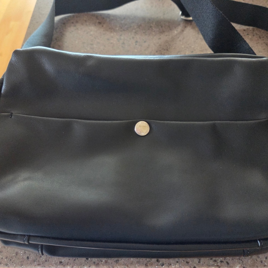 Our Legacy Wash Bag Black 착용 스타일