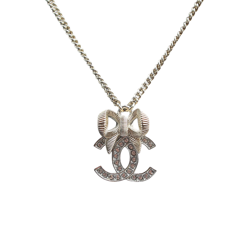 IT968LB9ST4G Chanel Champagne Gold Ribbon Heart Necklace