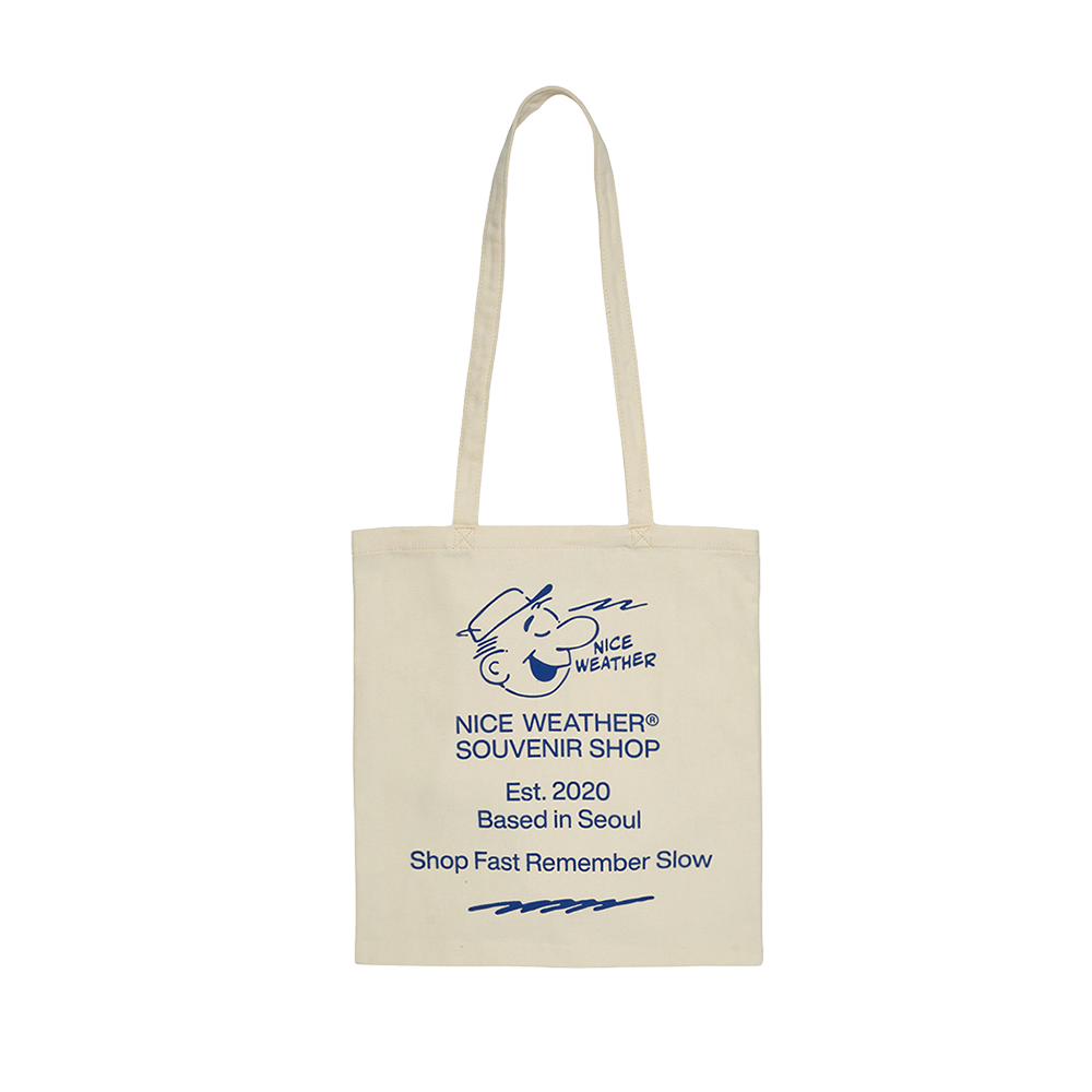 나이스 어패럴 수베니어 가이 토트백 바닐라(Nice Weather Apparel Souvenir Guy Tote Bag Vanilla)