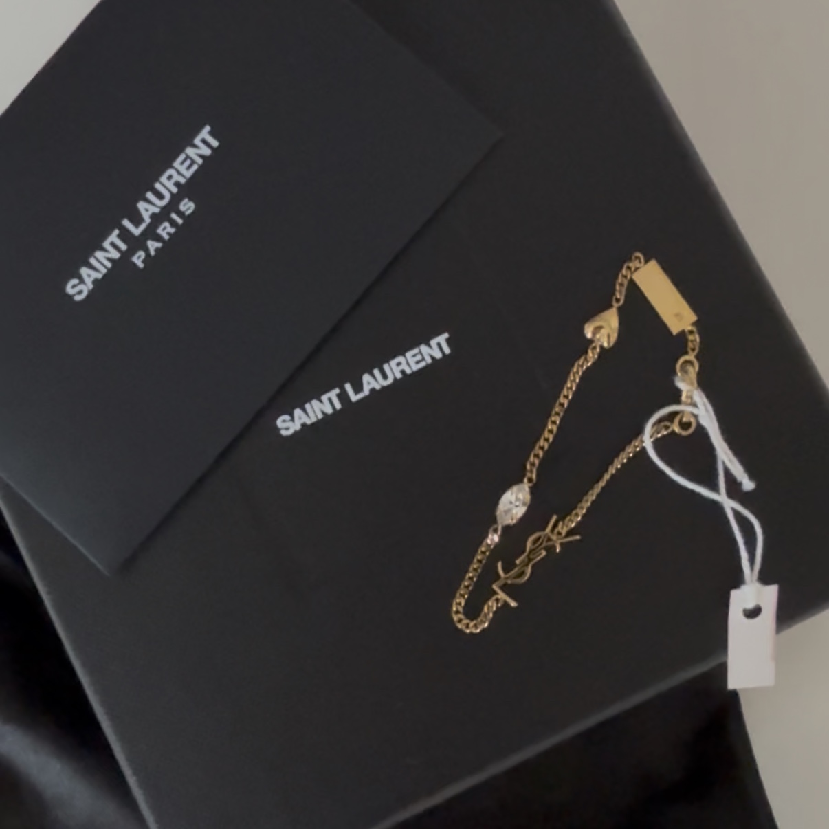 (W) Saint Laurent Opyum Heart Charm Bracelet in Metal Aged Brass Gold 착용 스타일