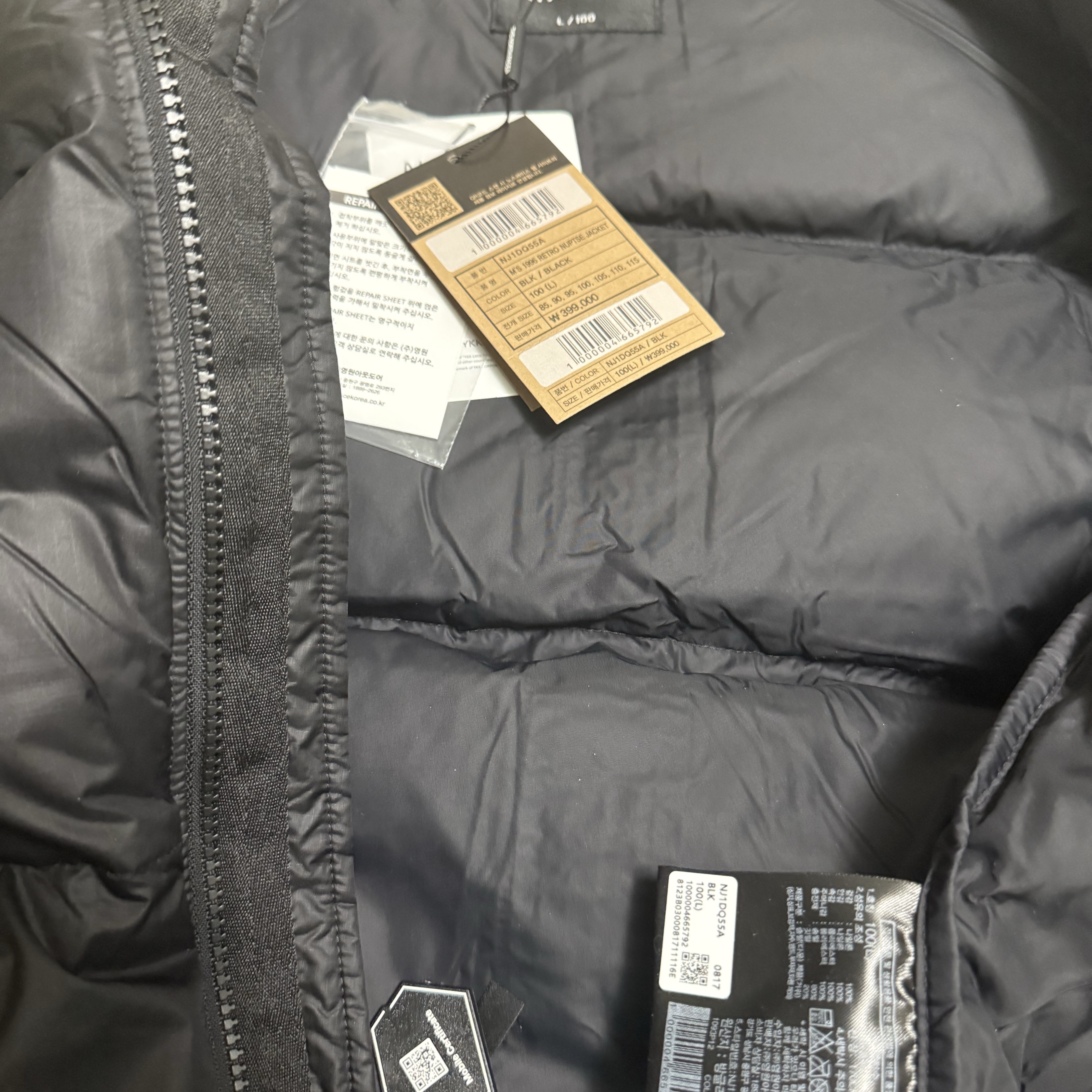 The North Face 1996 Eco Nuptse Jacket Black 착용 스타일