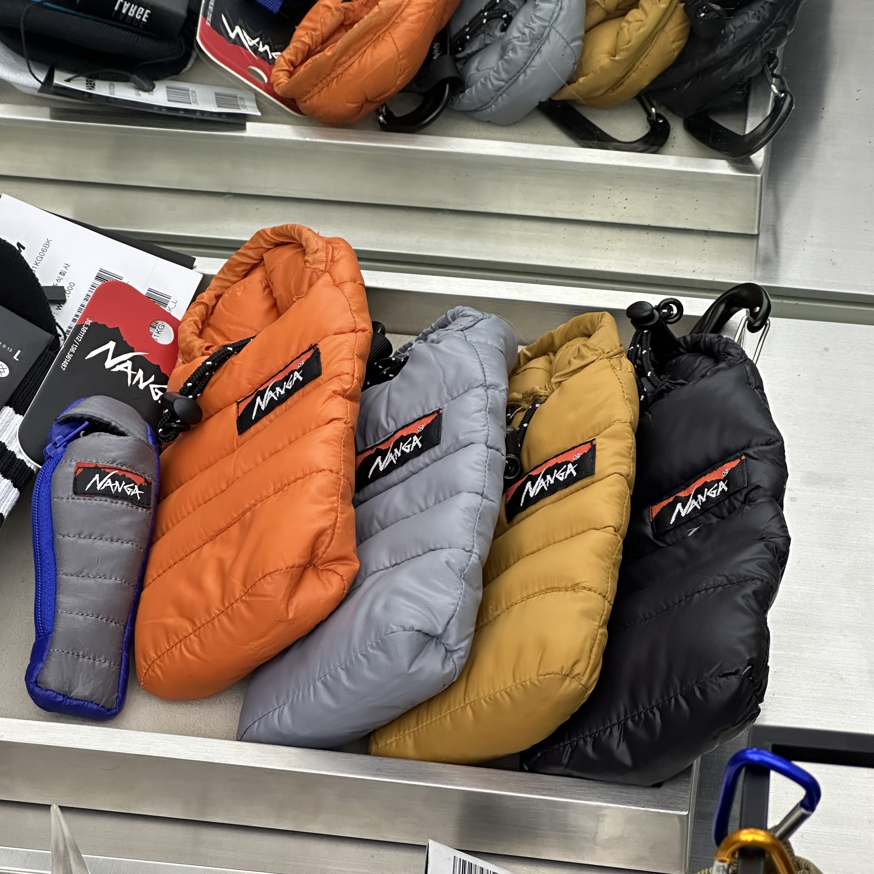 Nanga Mini Sleeping Bag Phone Case Black - 25FW 착용 스타일
