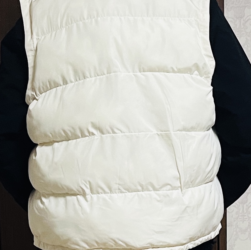 The North Face Superflex Nuptse RDS Down Vest Cream 착용 스타일
