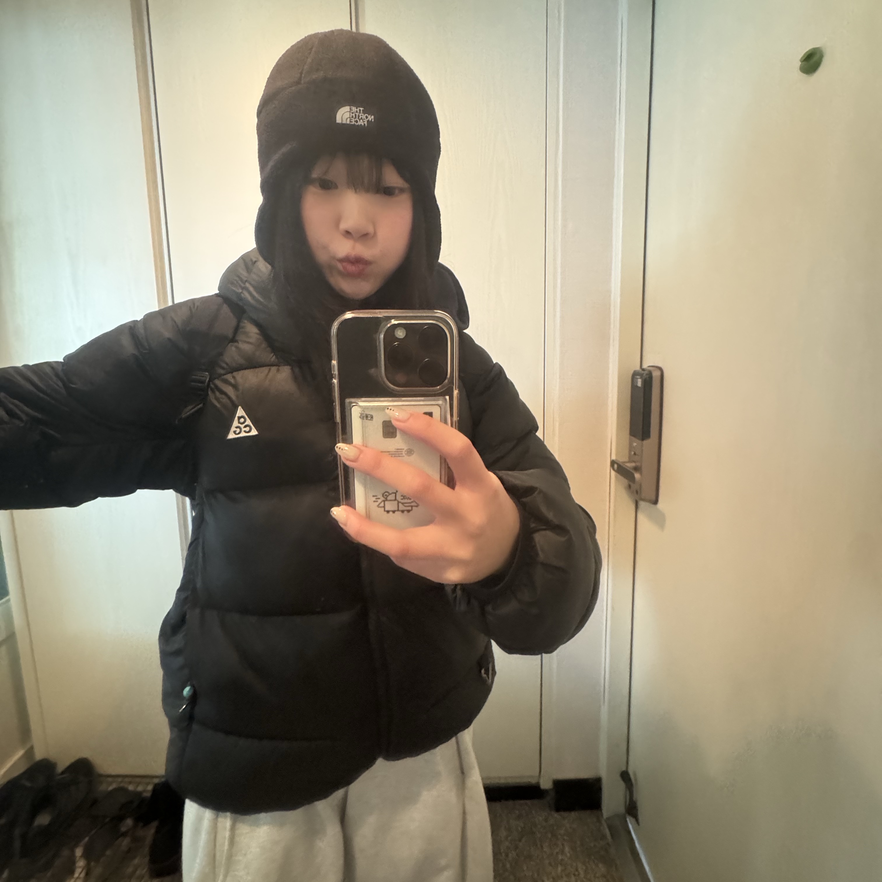 The North Face Fleece Earmuff Beanie Black, Nike ACG Therma-Fit ADV Lunar Lake Loose Hooded Jacket Black Summit White - Asia 착용 스타일