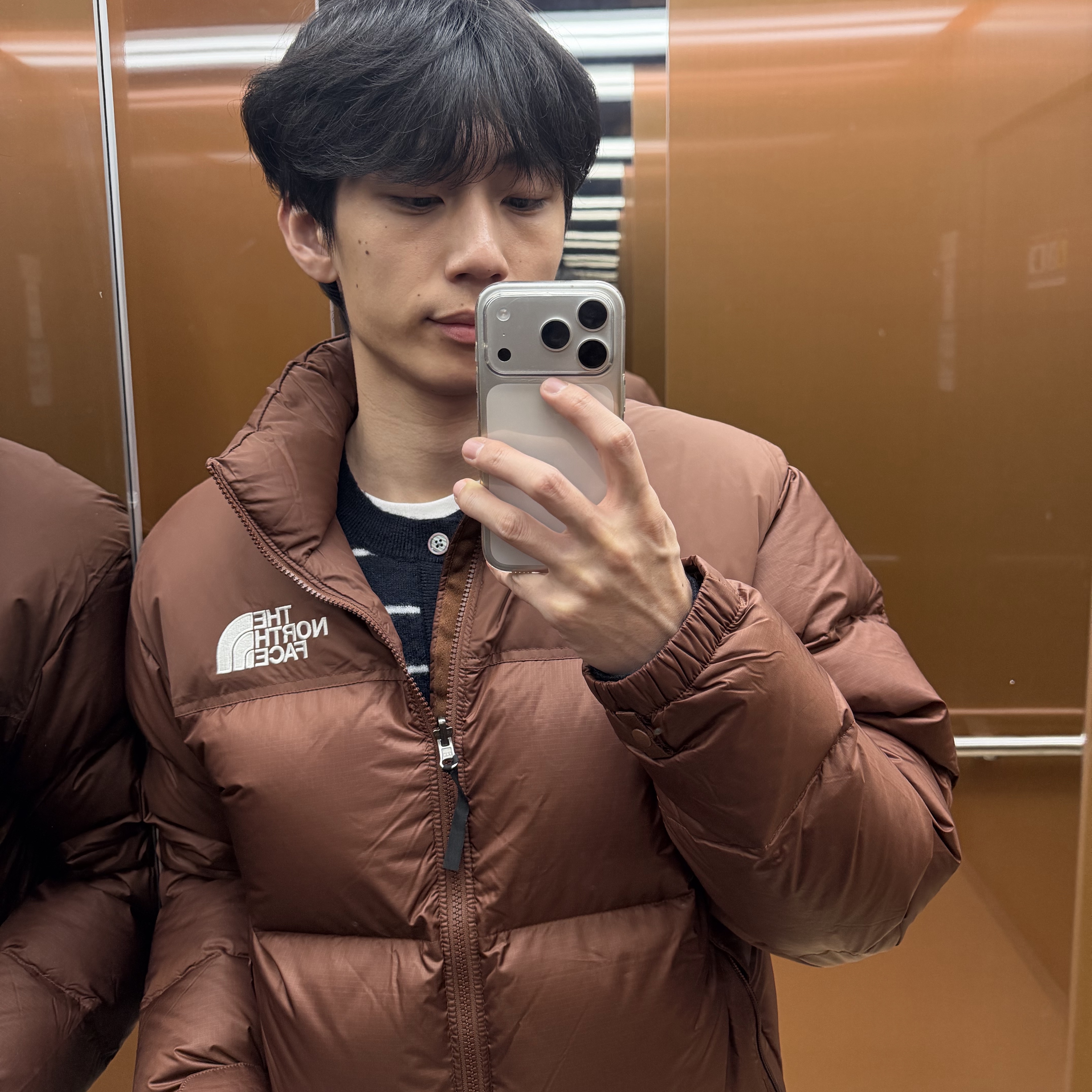 The North Face 1996 Eco Nuptse Jacket Brown, The North Face Waxed Cotton Earmuff Cap Black - 25FW 착용 스타일 - 1