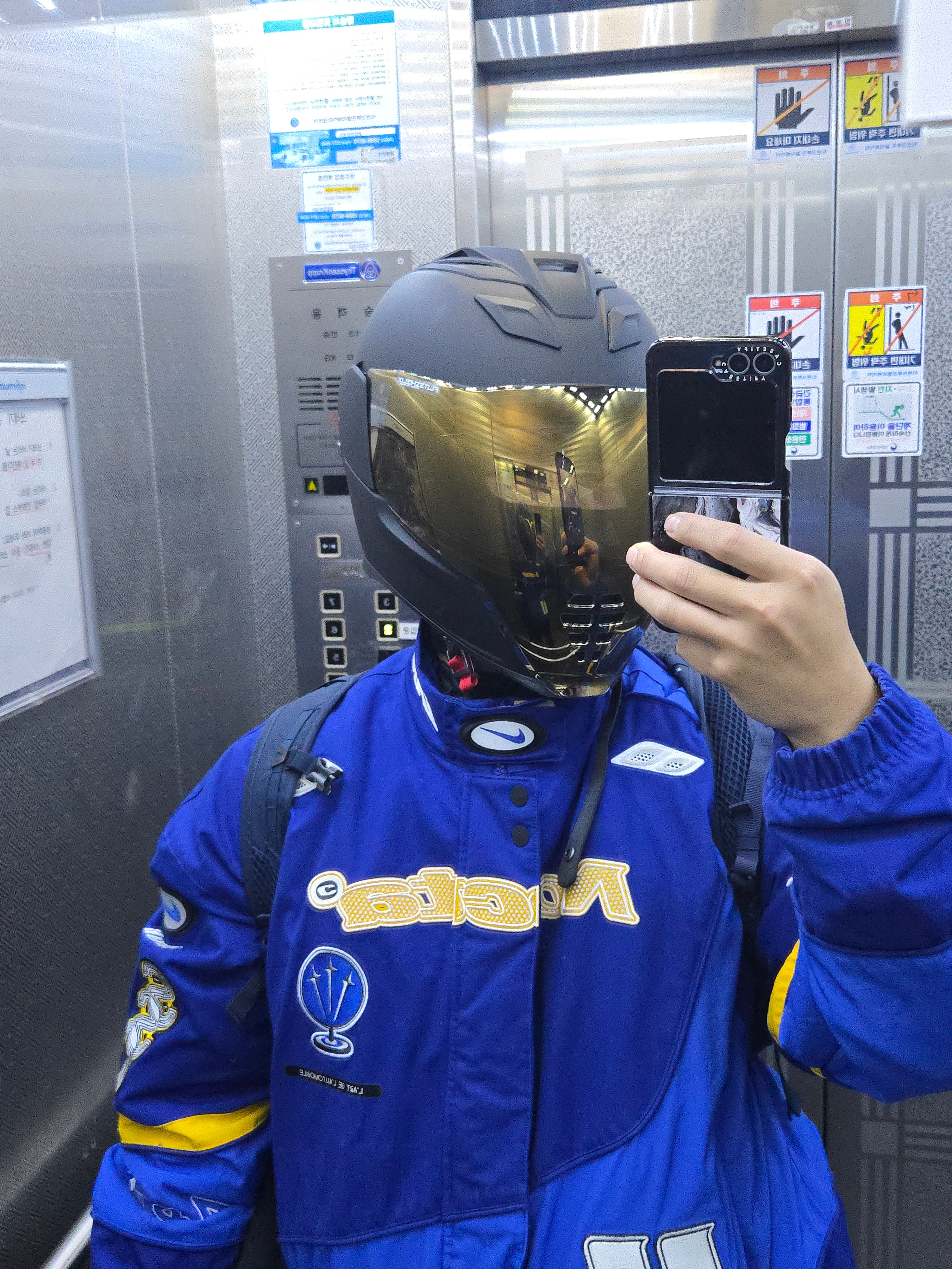 Nike x Drake Nocta x Kar L'Art De L'Automobile Racing Jacket Deep Royal Blue (FD2194-455) 착용 스타일 - 1