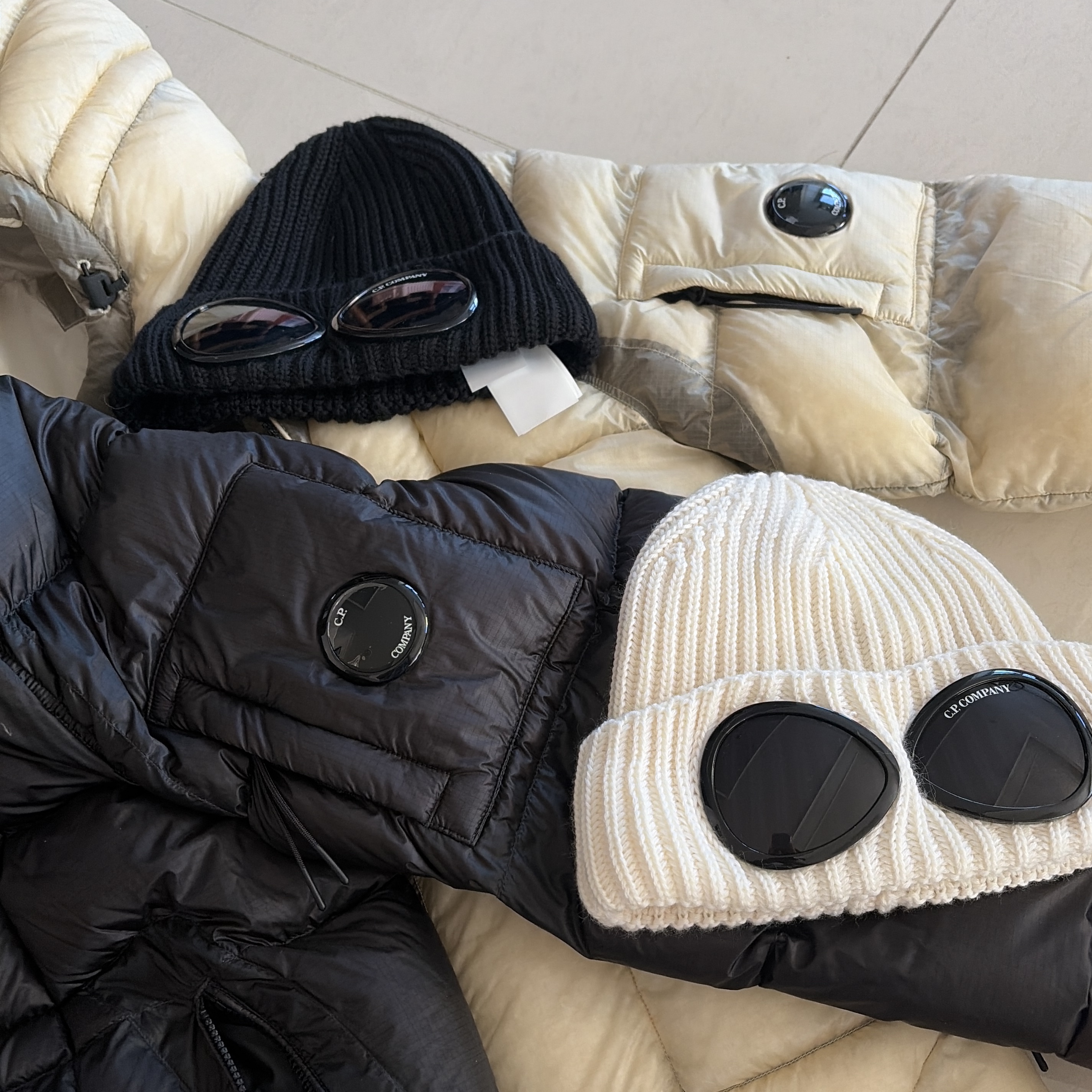 C.P. Company D.D. Shell Hooded Down Jacket Pistachio Shell Beige - 25FW, C.P. Company Extrafine Merino Wool Goggle Beanie Black - 25FW 착용 스타일