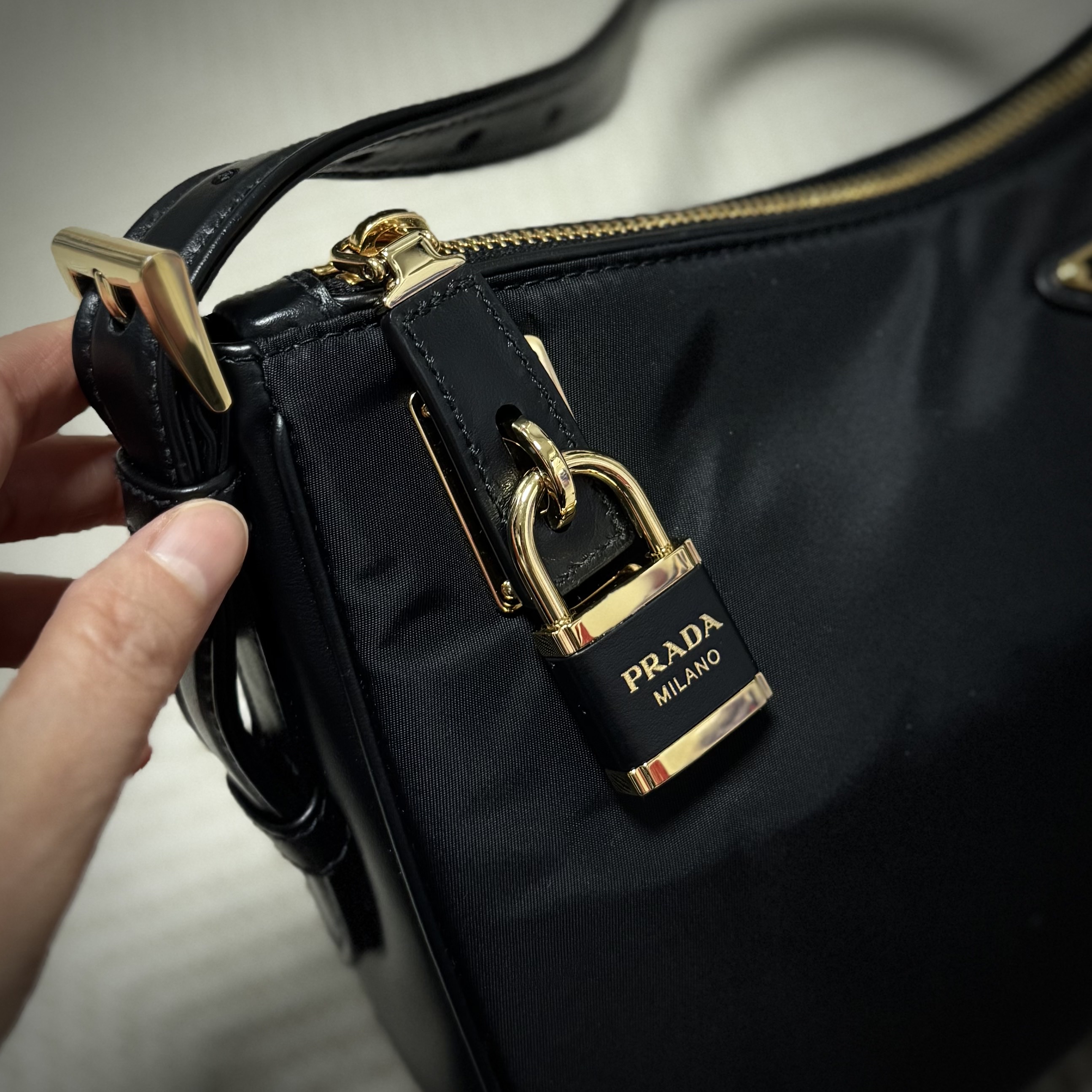 Prada Aimee Large Re-Nylon and Leather Shoulder Bag with Padlock Black 착용 스타일 - 2