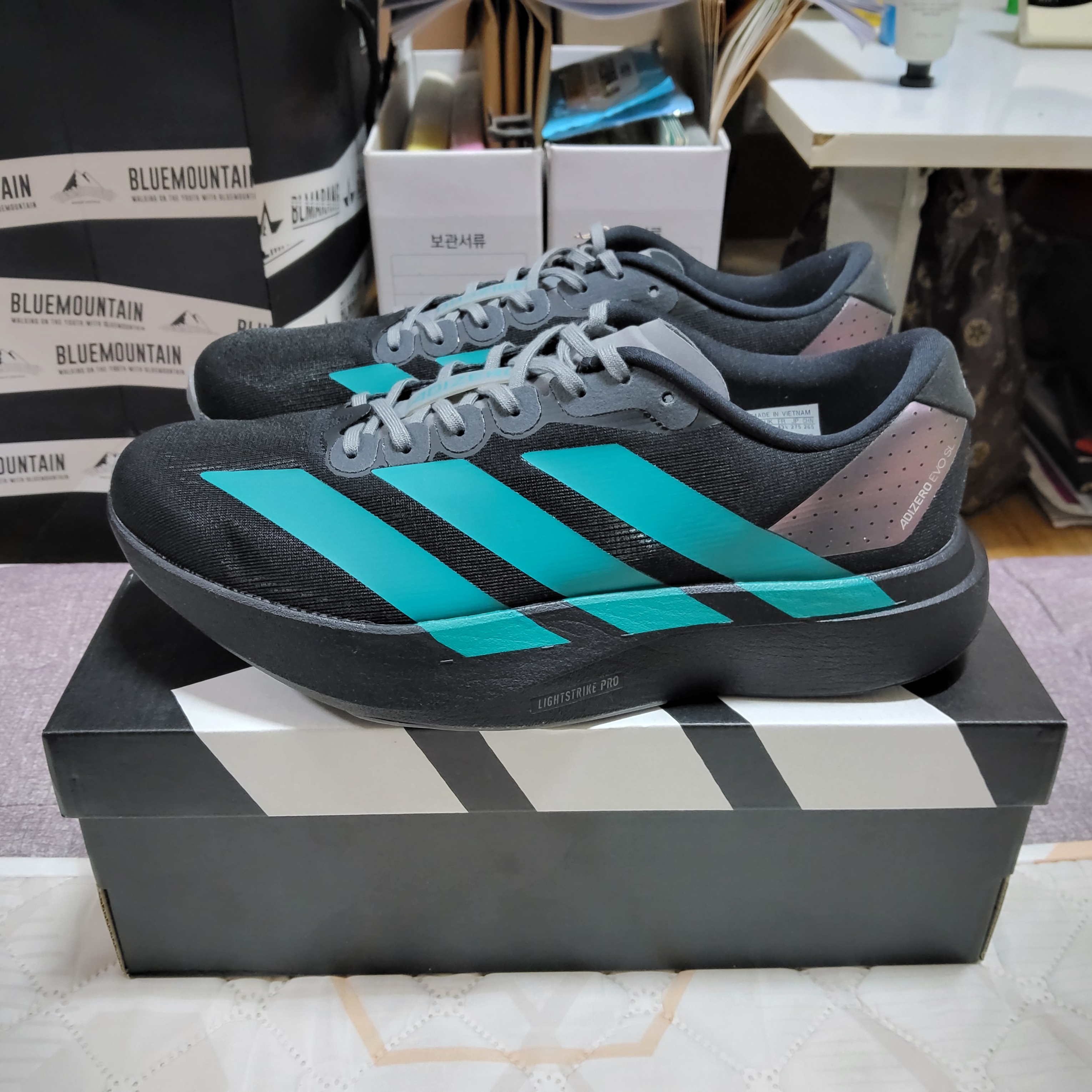 Adidas Adizero EVO SL  Core Black Pure Teal 착용 스타일 - 1