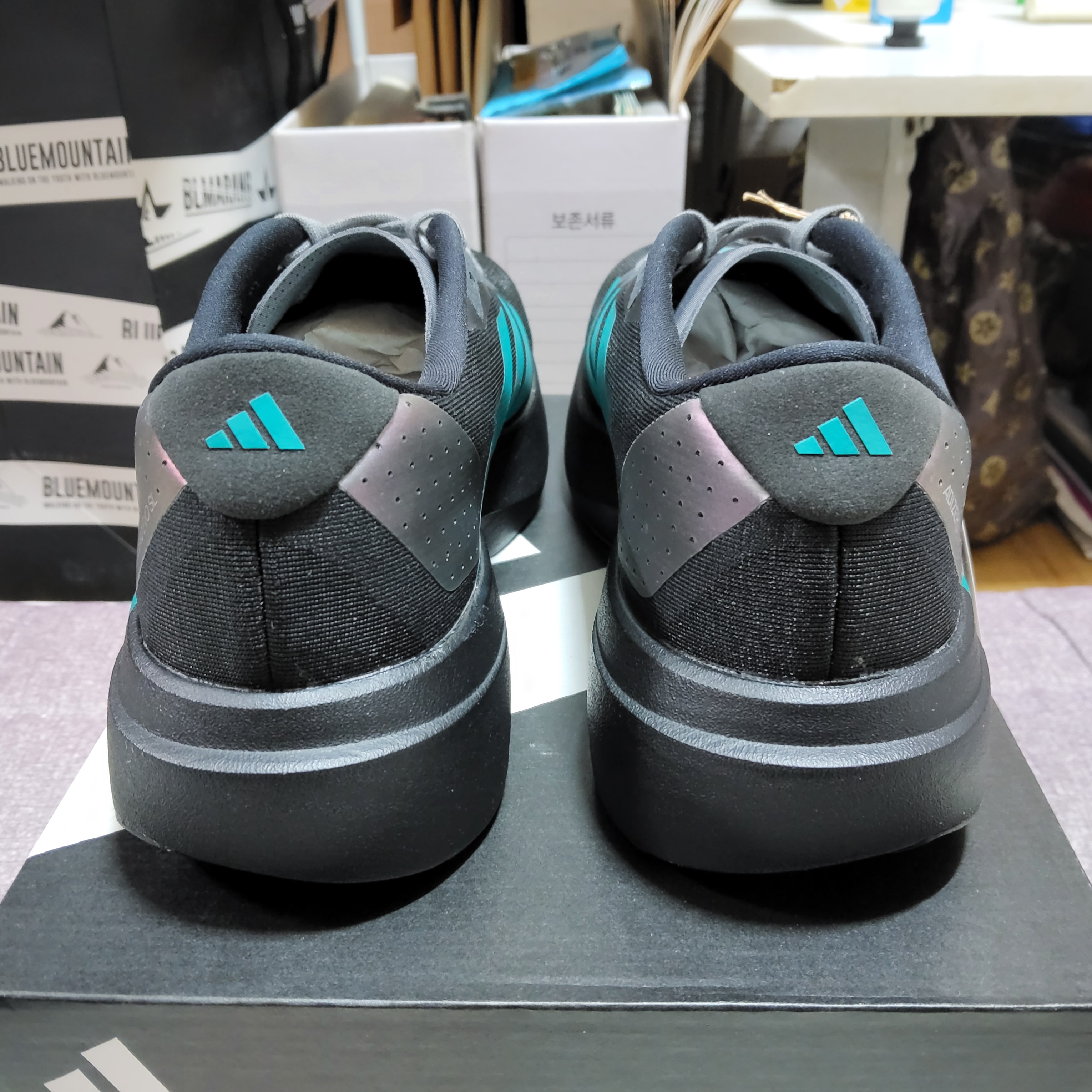 Adidas Adizero EVO SL  Core Black Pure Teal 착용 스타일 - 3