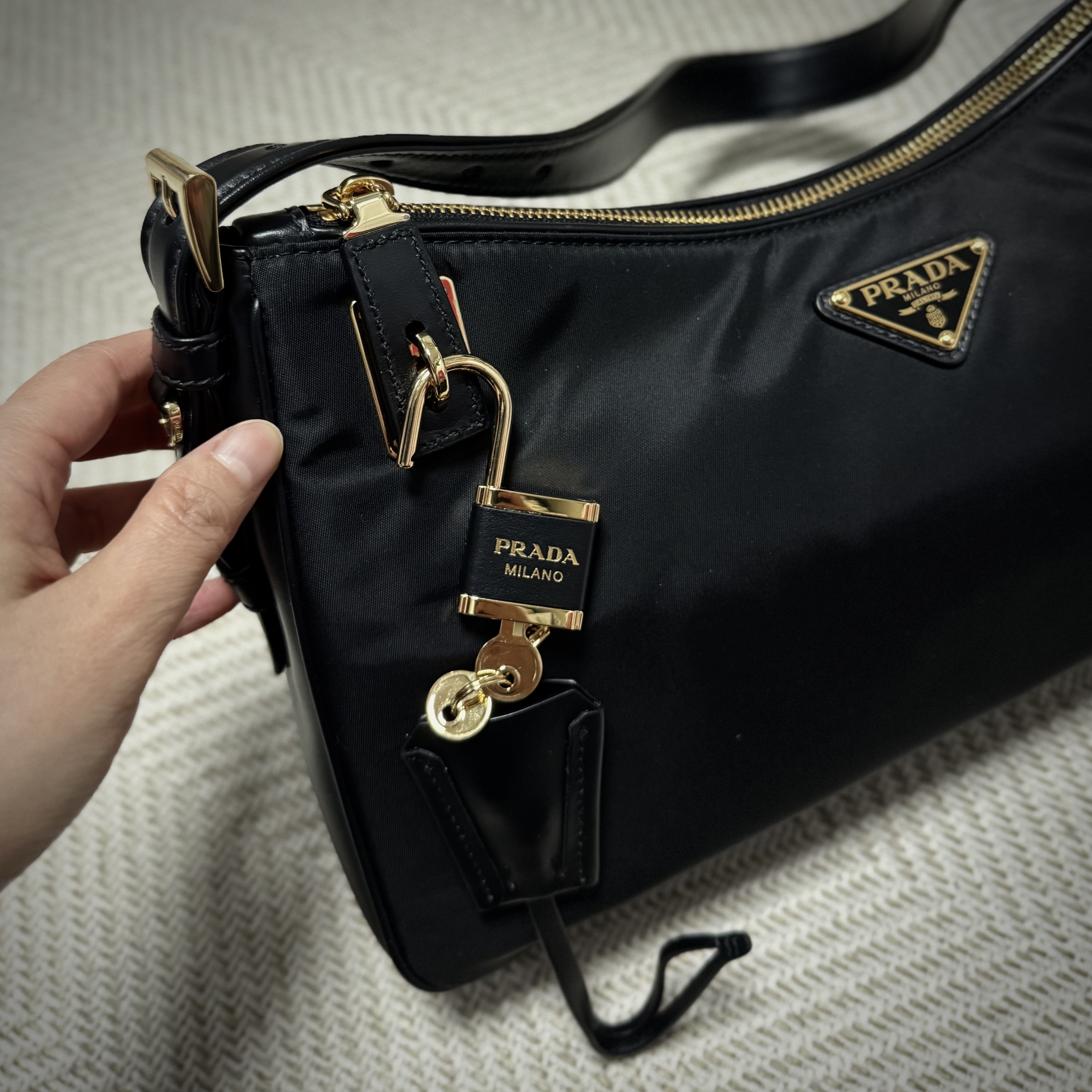 Prada Aimee Large Re-Nylon and Leather Shoulder Bag with Padlock Black 착용 스타일 - 1