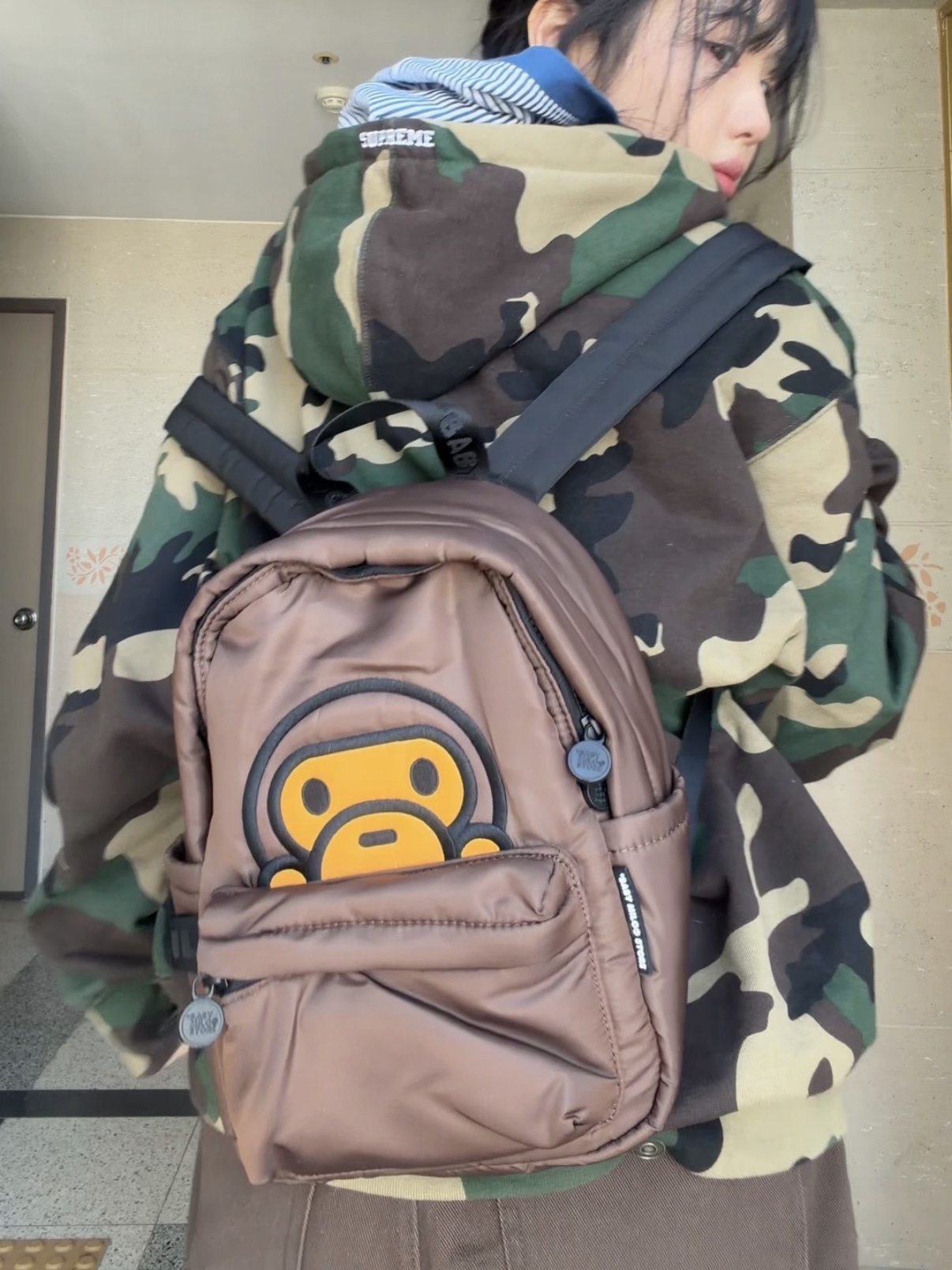 BAPE Baby Milo Small Backpack #1 Brown, Supreme S Logo Zip Up Hooded Sweatshirt Woodland Camo - 25FW 착용 스타일 - 2