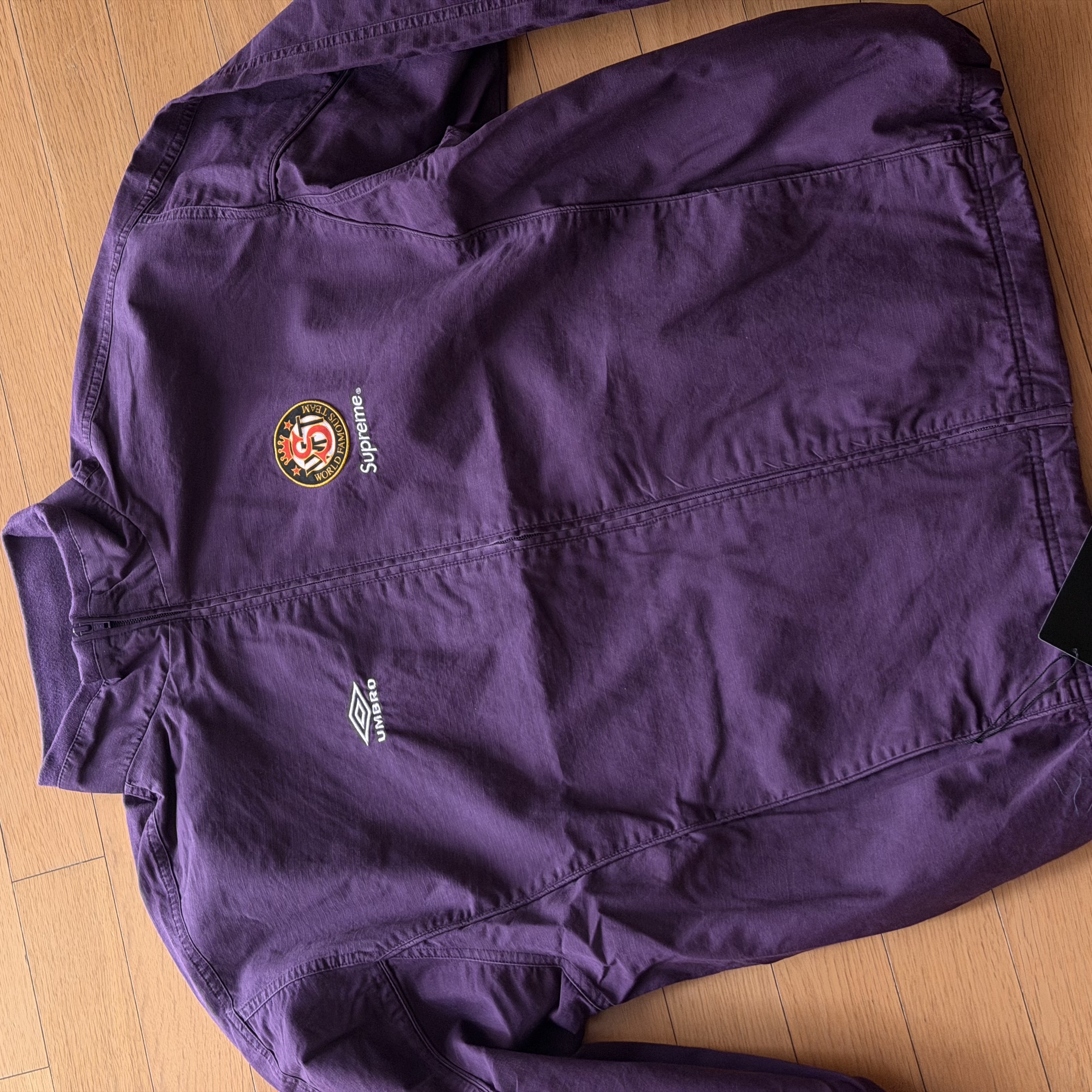 Supreme Backpack Black - 26SS, Supreme x Umbro Cotton Ripstop Track Jacket Plum - 26SS 착용 스타일 - 2