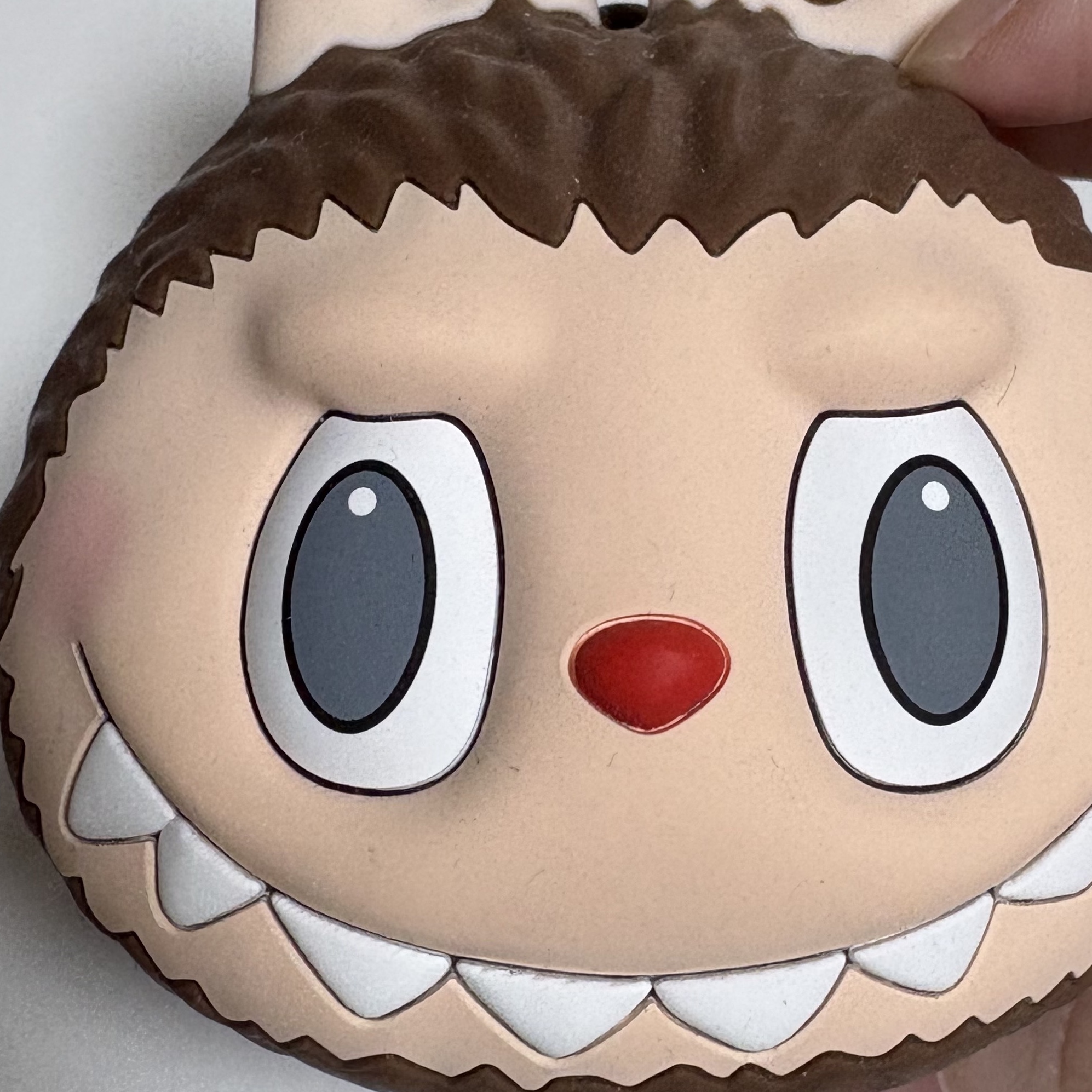 Pop Mart Labubu Original Silicone Earphone Bag Brown 착용 스타일