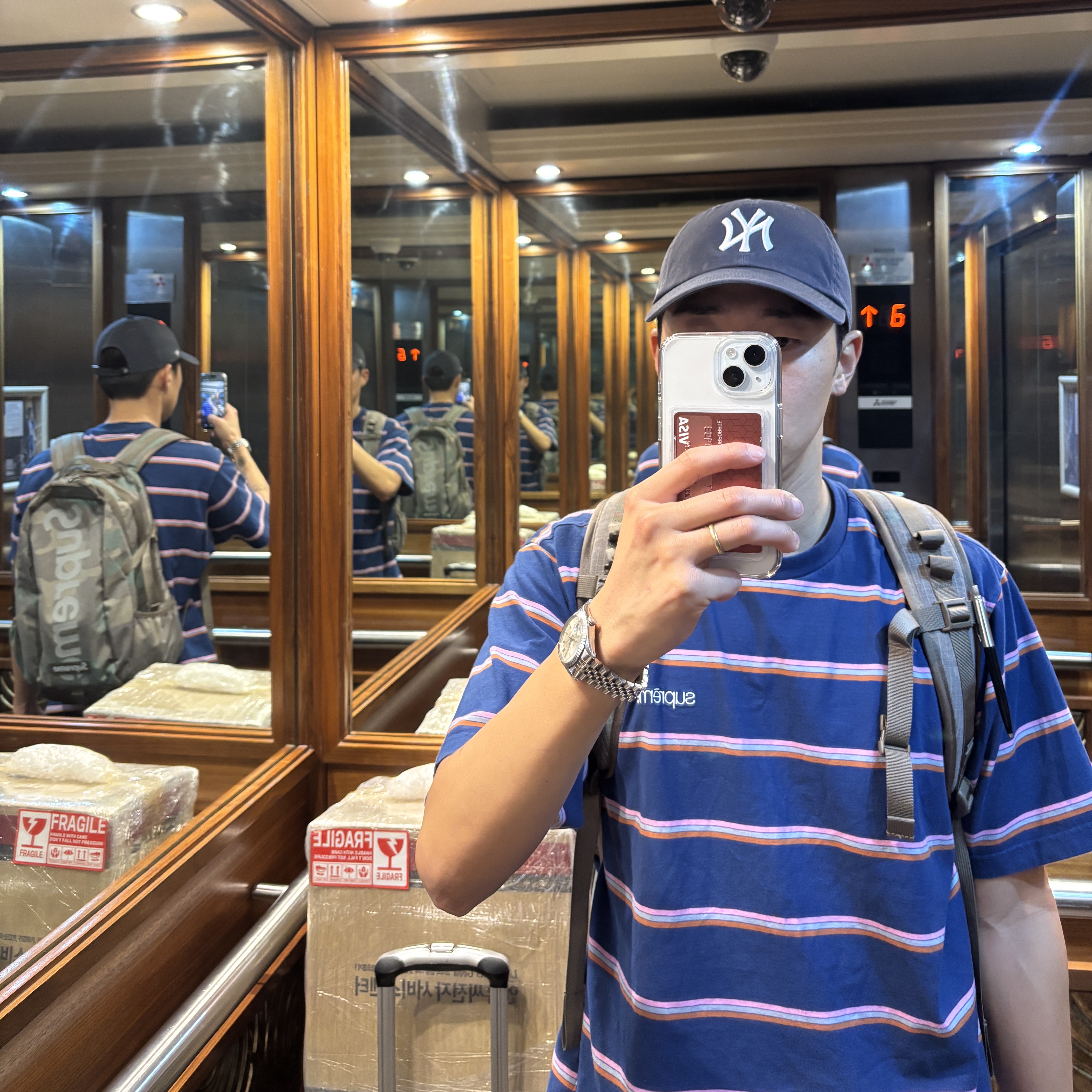 Supreme Stripe S/S Top Navy - 24FW, Supreme Backpack Woodland Camo - 24SS 착용 스타일